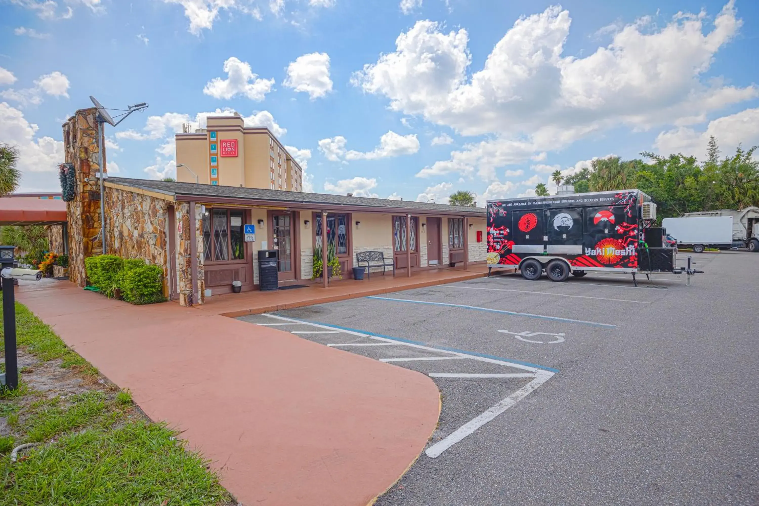 Parking in Liberty Garden Inn by OYO Kissimmee near Disney World Parking in Liberty Garden Inn by OYO Kissimmee near Disney World