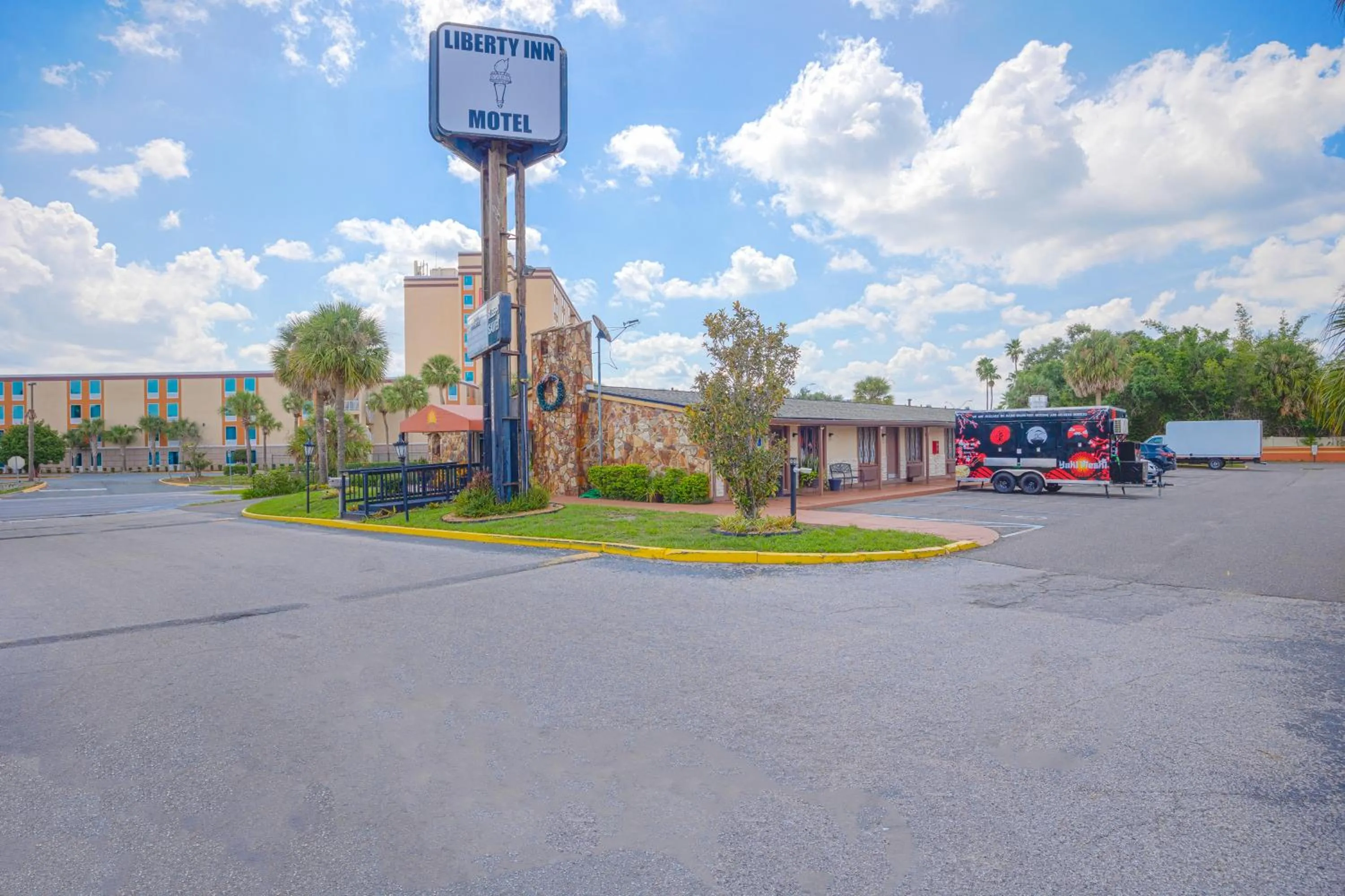 Property building in Liberty Garden Inn by OYO Kissimmee near Disney World