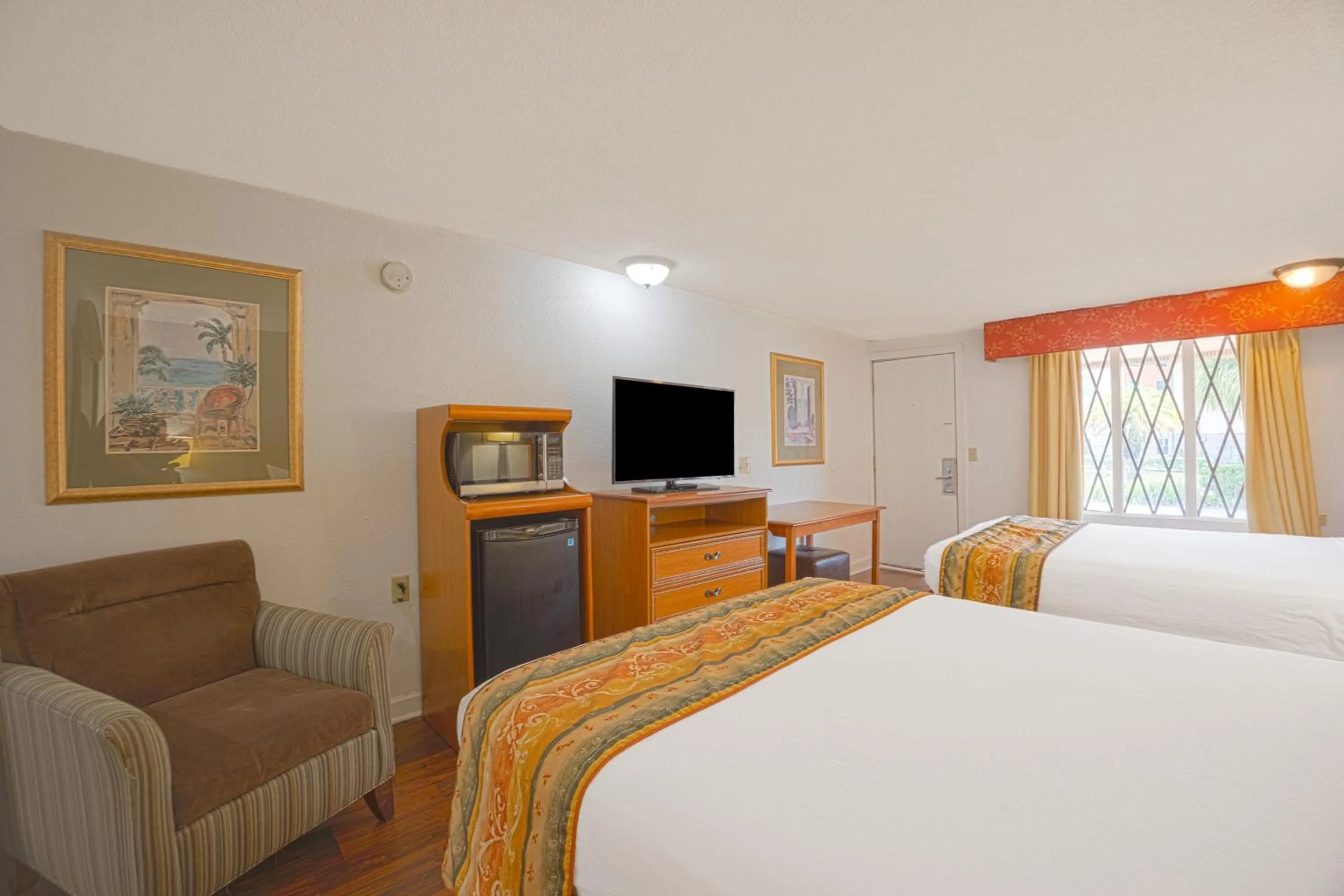Bedroom, Bed in Liberty Garden Inn by OYO Kissimmee near Disney World