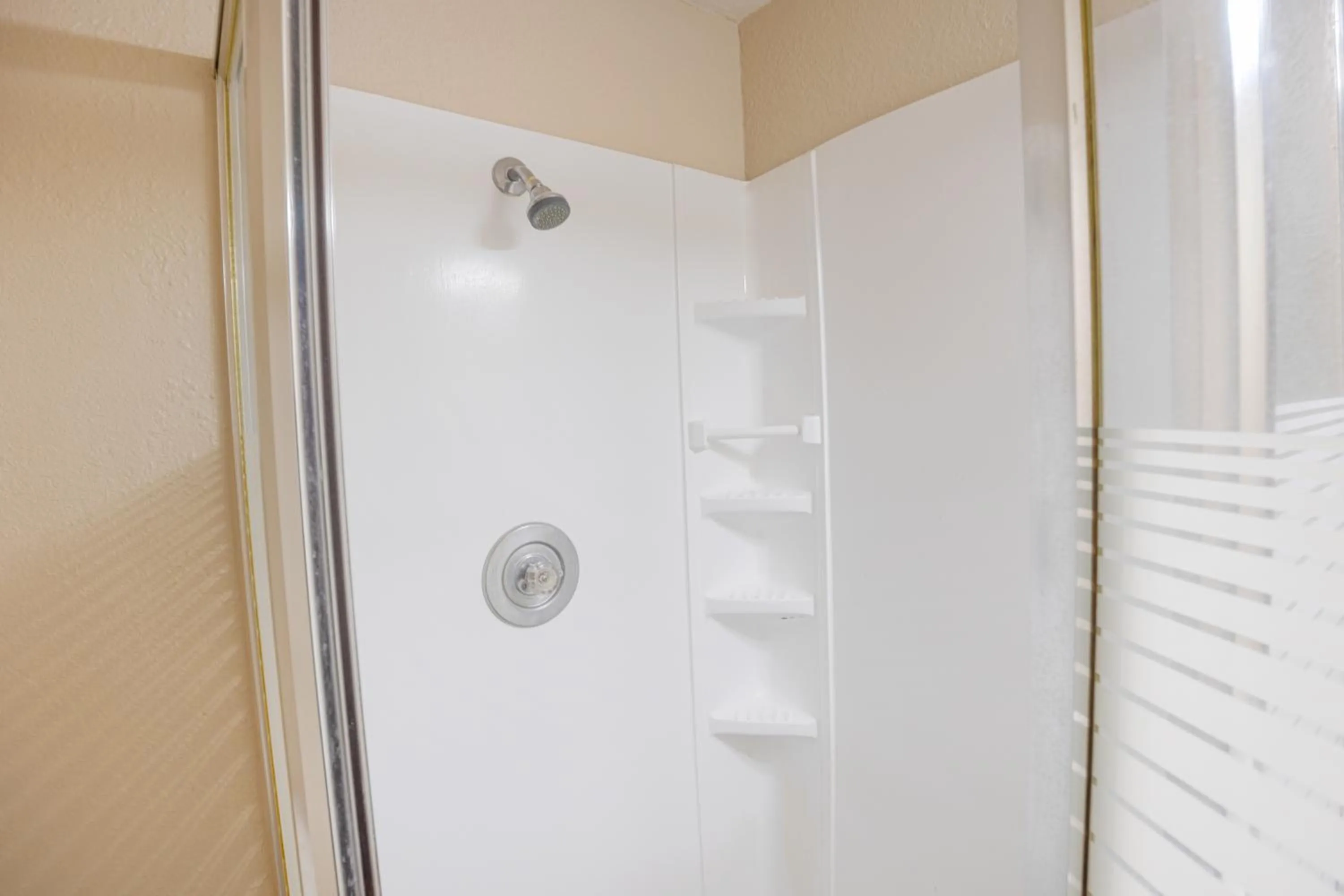 Bathroom in Liberty Garden Inn by OYO Kissimmee near Disney World