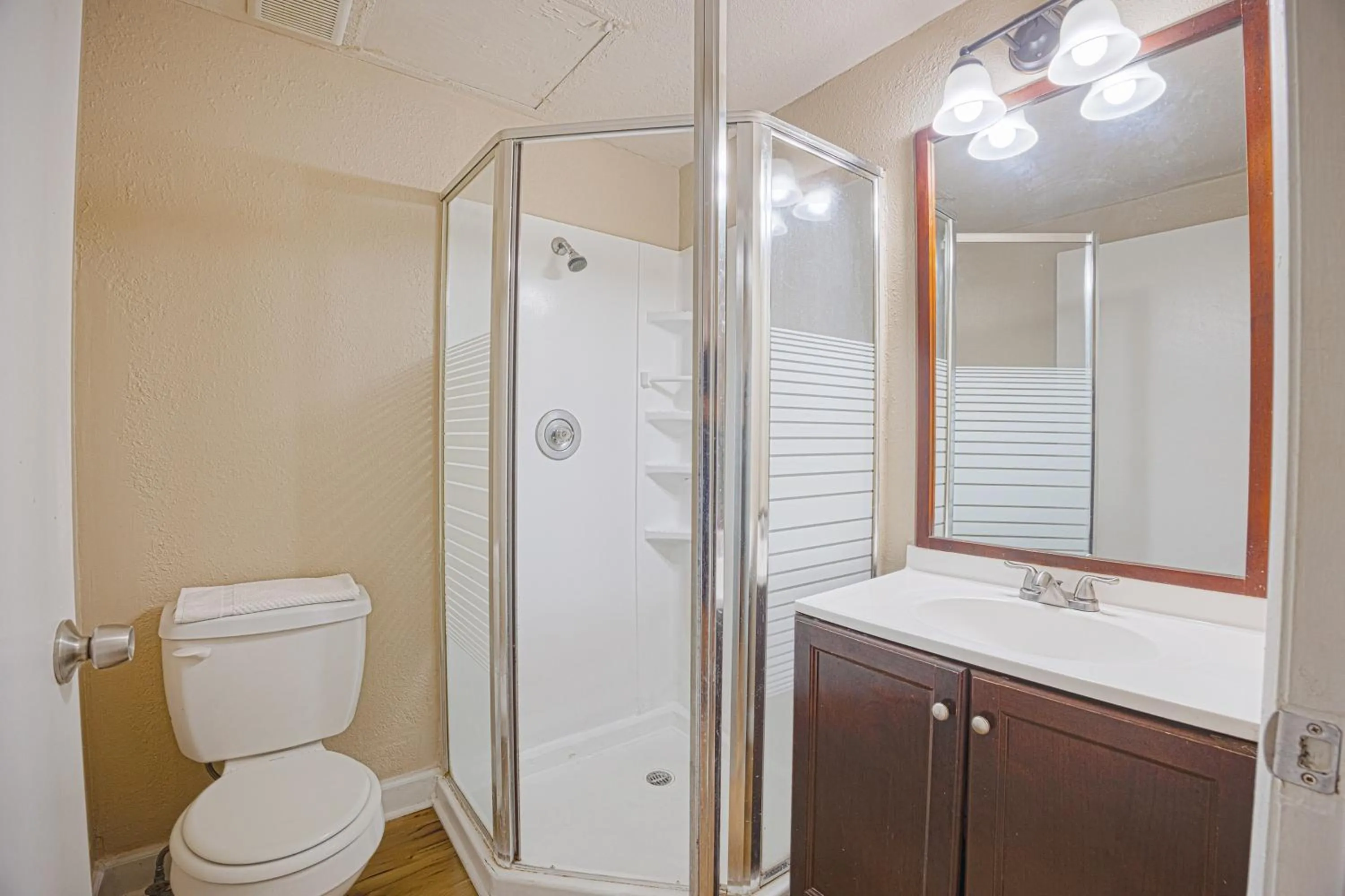 Bathroom in Liberty Garden Inn by OYO Kissimmee near Disney World