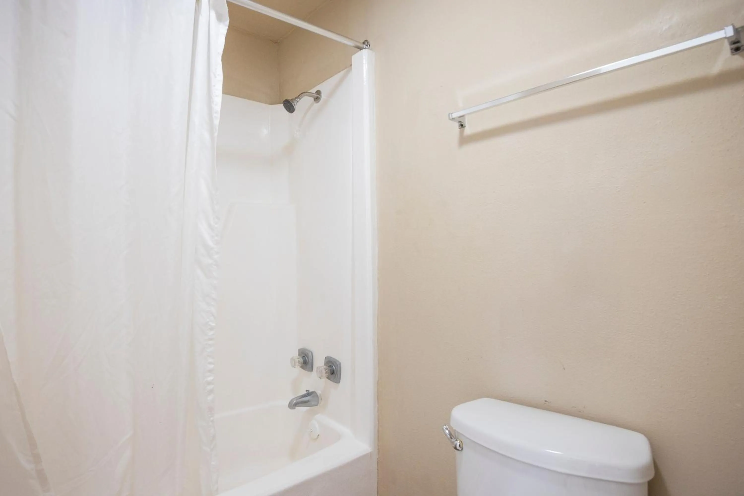 Bathroom in Liberty Garden Inn by OYO Kissimmee near Disney World