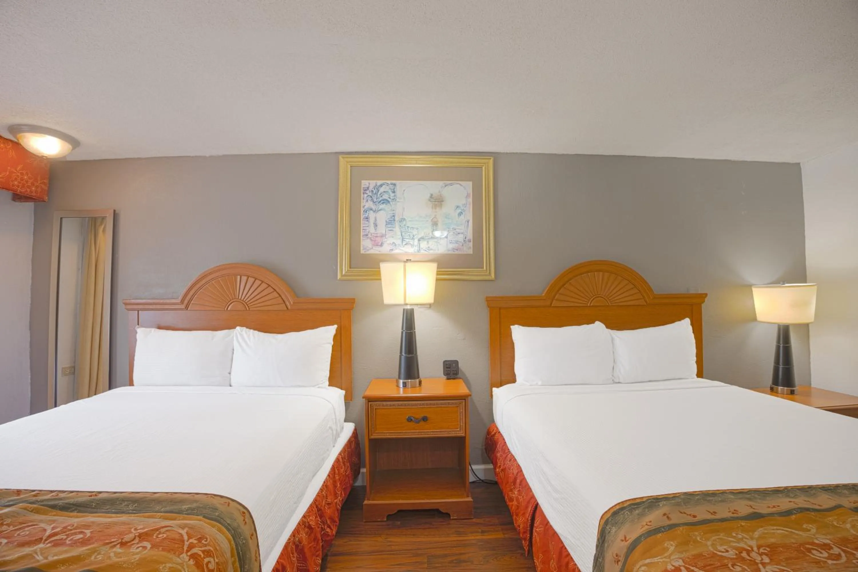 Bedroom, Bed in Liberty Garden Inn by OYO Kissimmee near Disney World