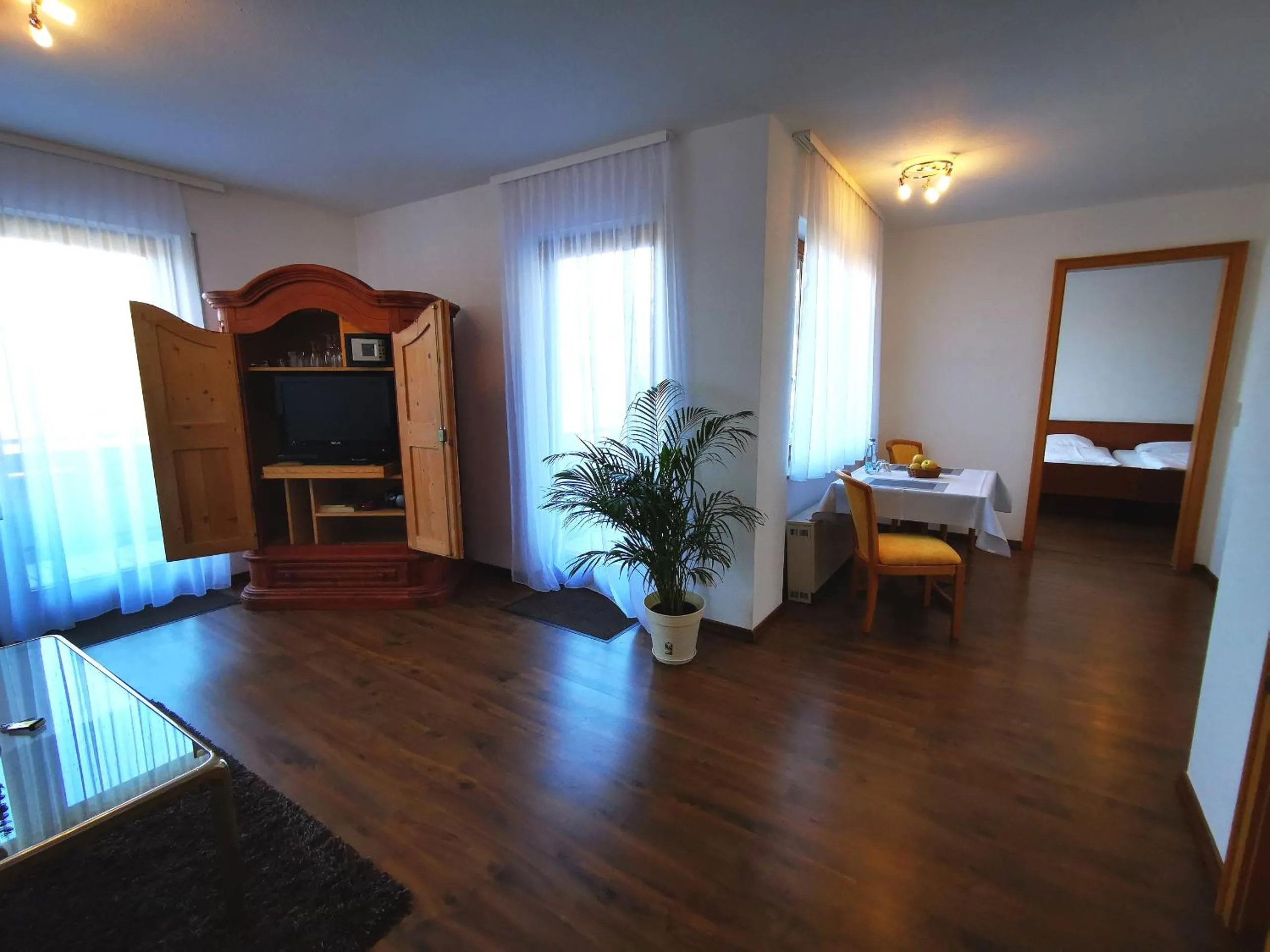 Living room, Bed in Park Appartements