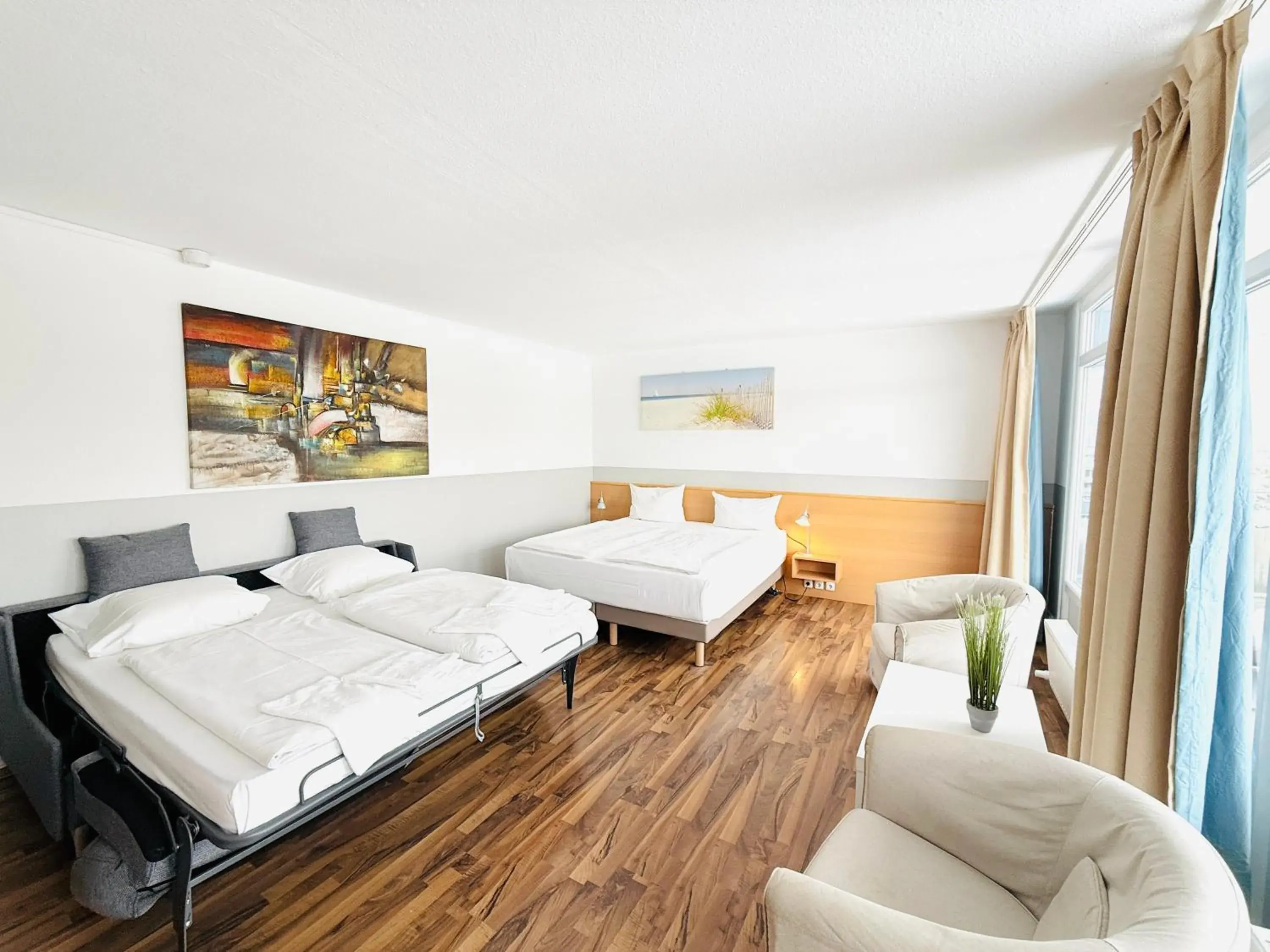 Photo of the whole room, Bed in Hotel Plöner See by Tulip Inn Photo of the whole room, Bed in Hotel Plöner See by Tulip Inn