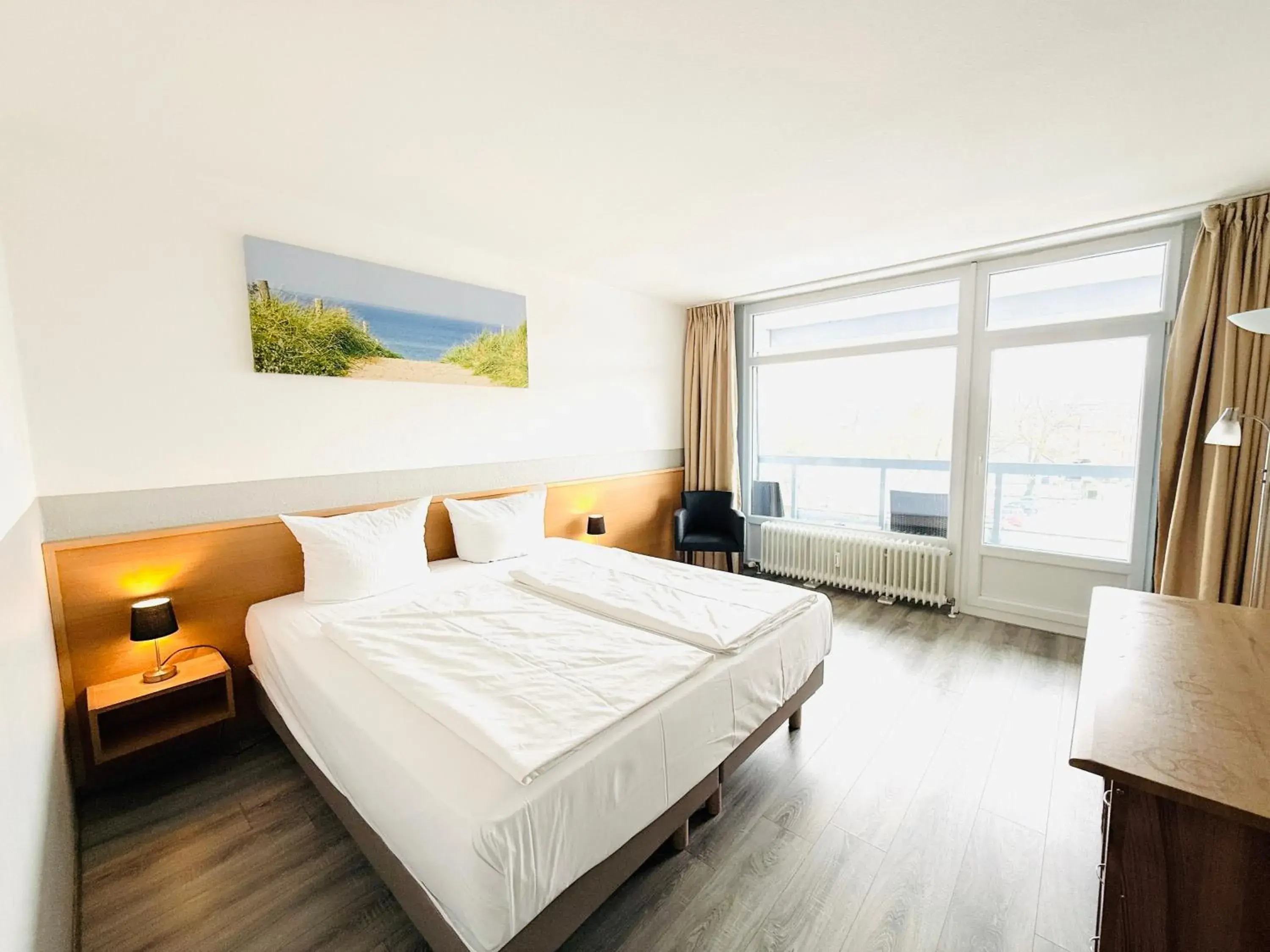 Photo of the whole room, Bed in Hotel Plöner See by Tulip Inn Photo of the whole room, Bed in Hotel Plöner See by Tulip Inn