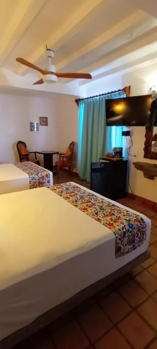 Bed in Hotel Posada Pablo de Tarso