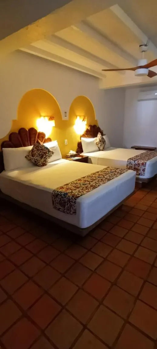 Bed in Hotel Posada Pablo de Tarso