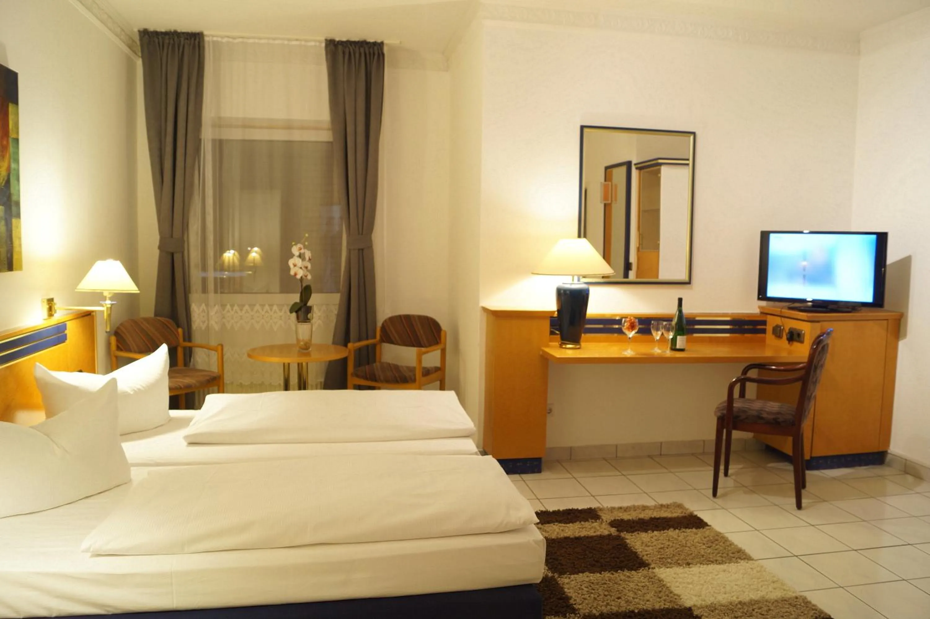 Photo of the whole room, Bed in Hotel Rahlstedter Hof