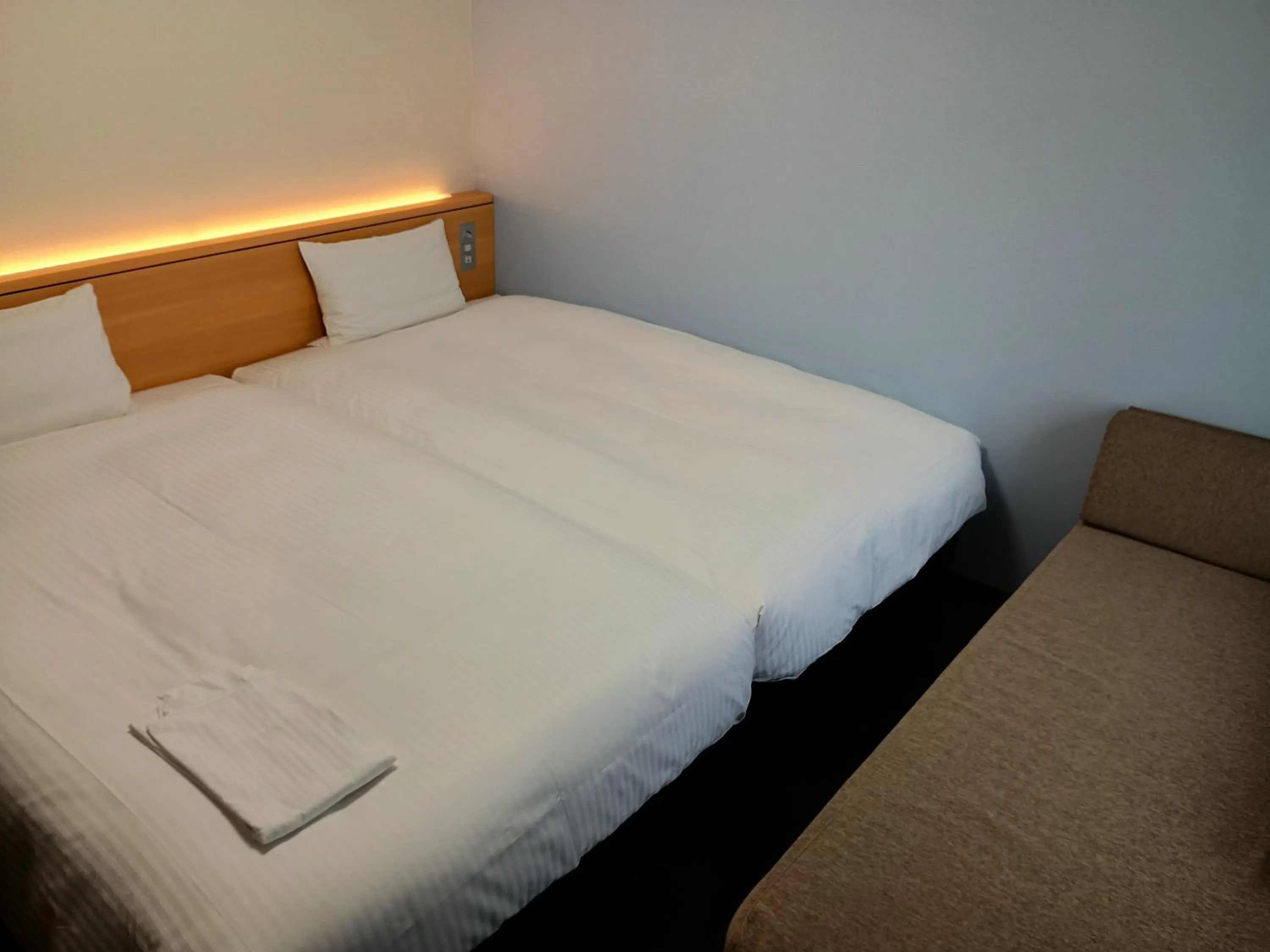 Bed in Richmond Hotel Hakata Ekimae