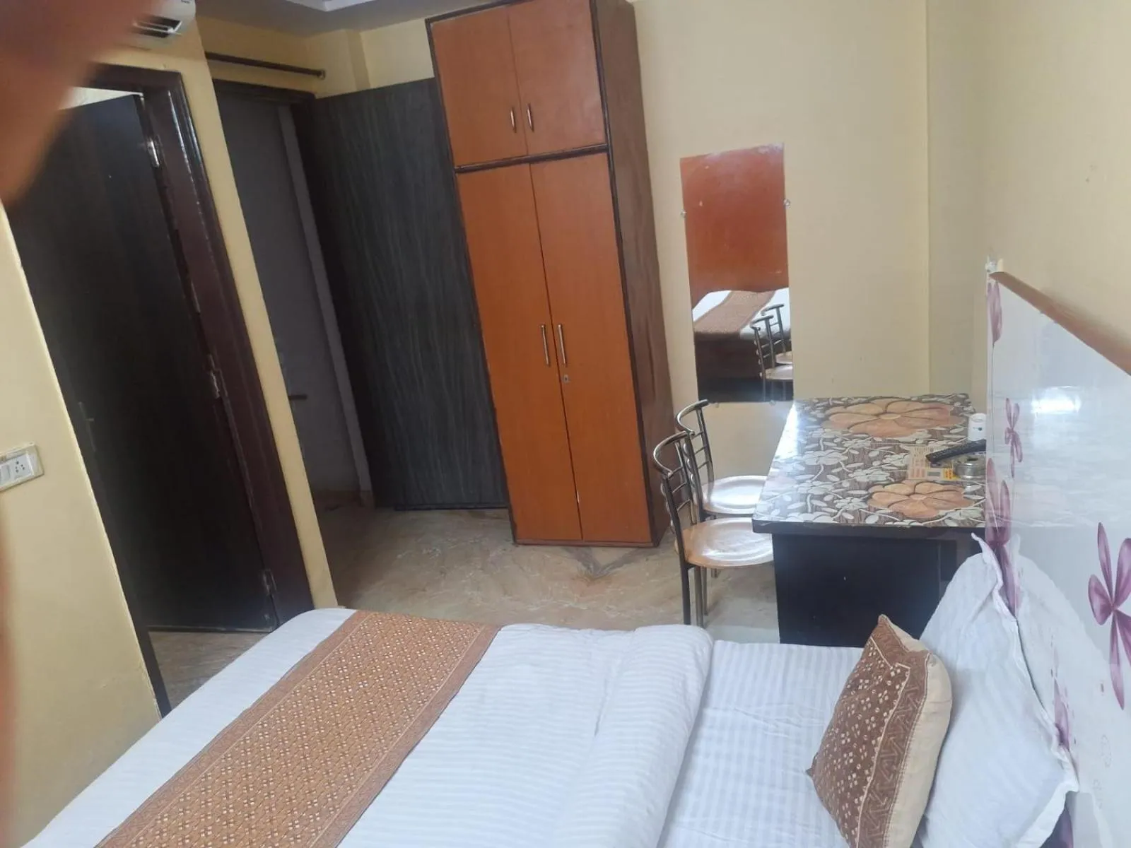 Bed in SSS Group Hotel Dwarka Delhi