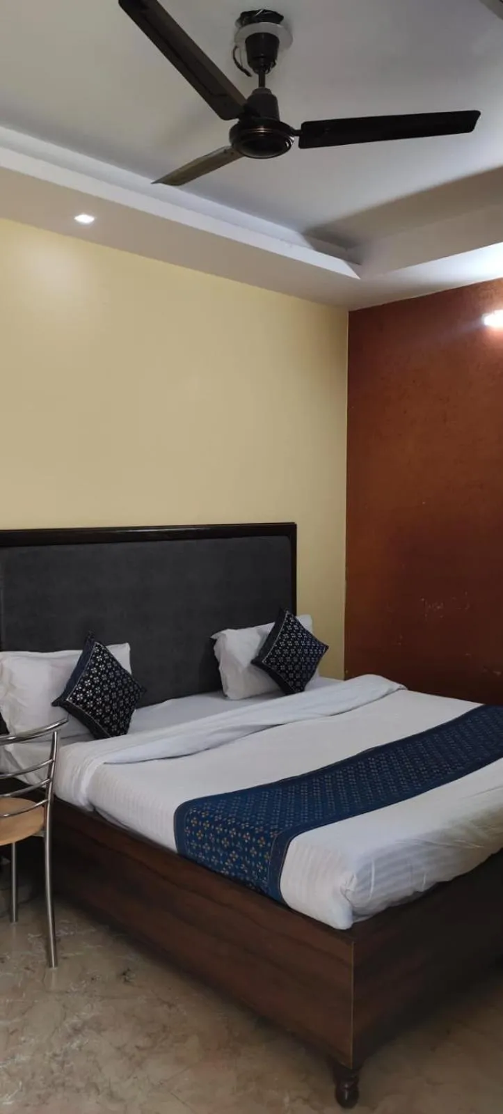 Bed in SSS Group Hotel Dwarka Delhi