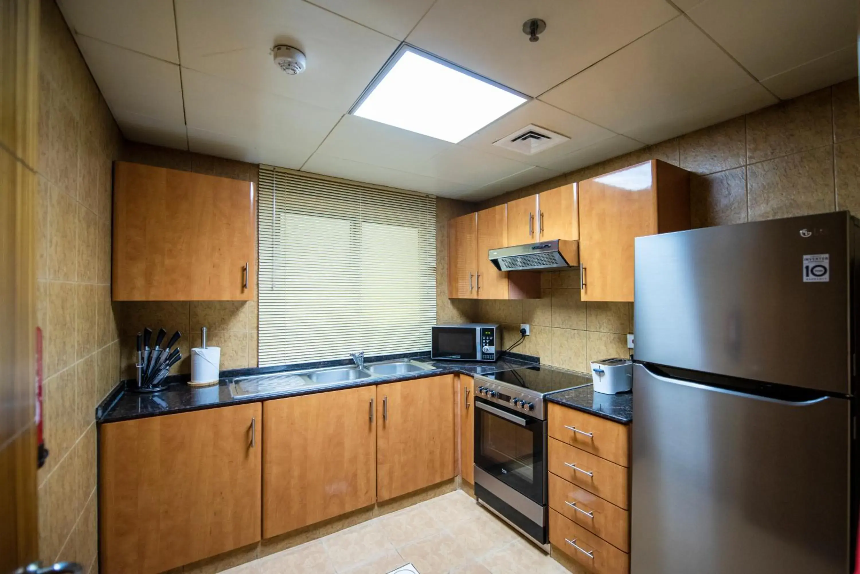 kitchen, Kitchen/Kitchenette in Radiance Premium Suites