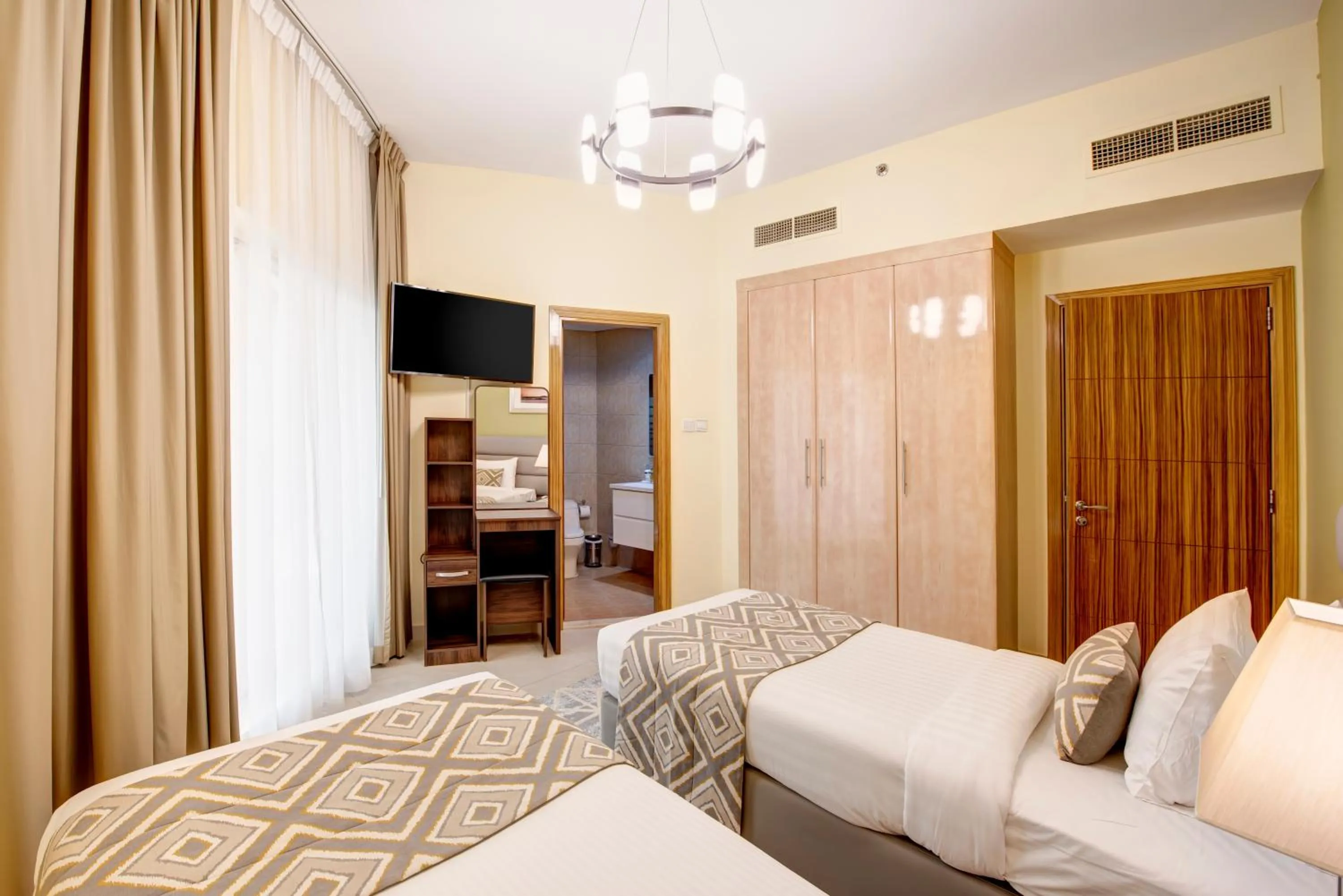 Bedroom, Bed in Radiance Premium Suites