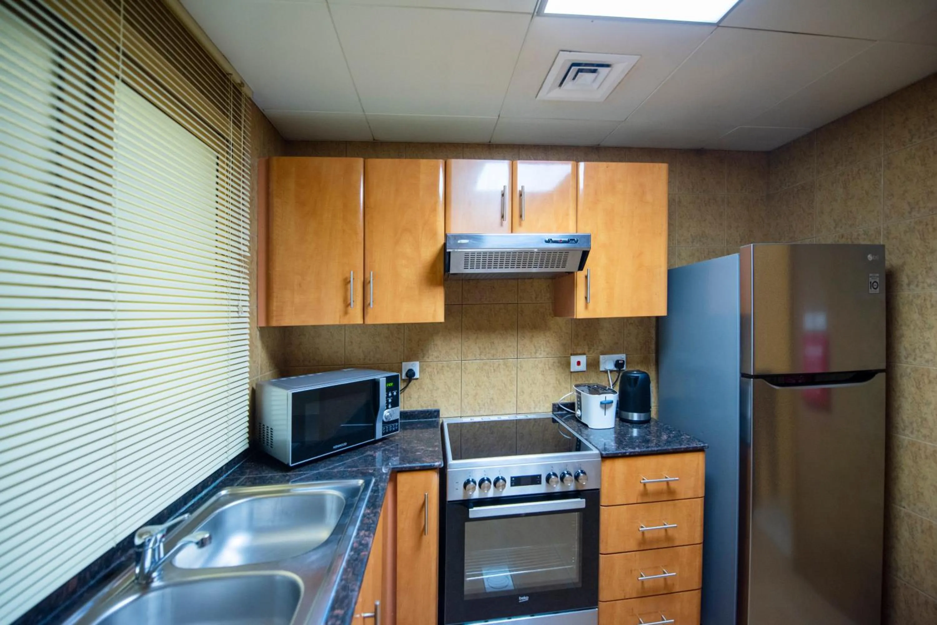 kitchen in Radiance Premium Suites