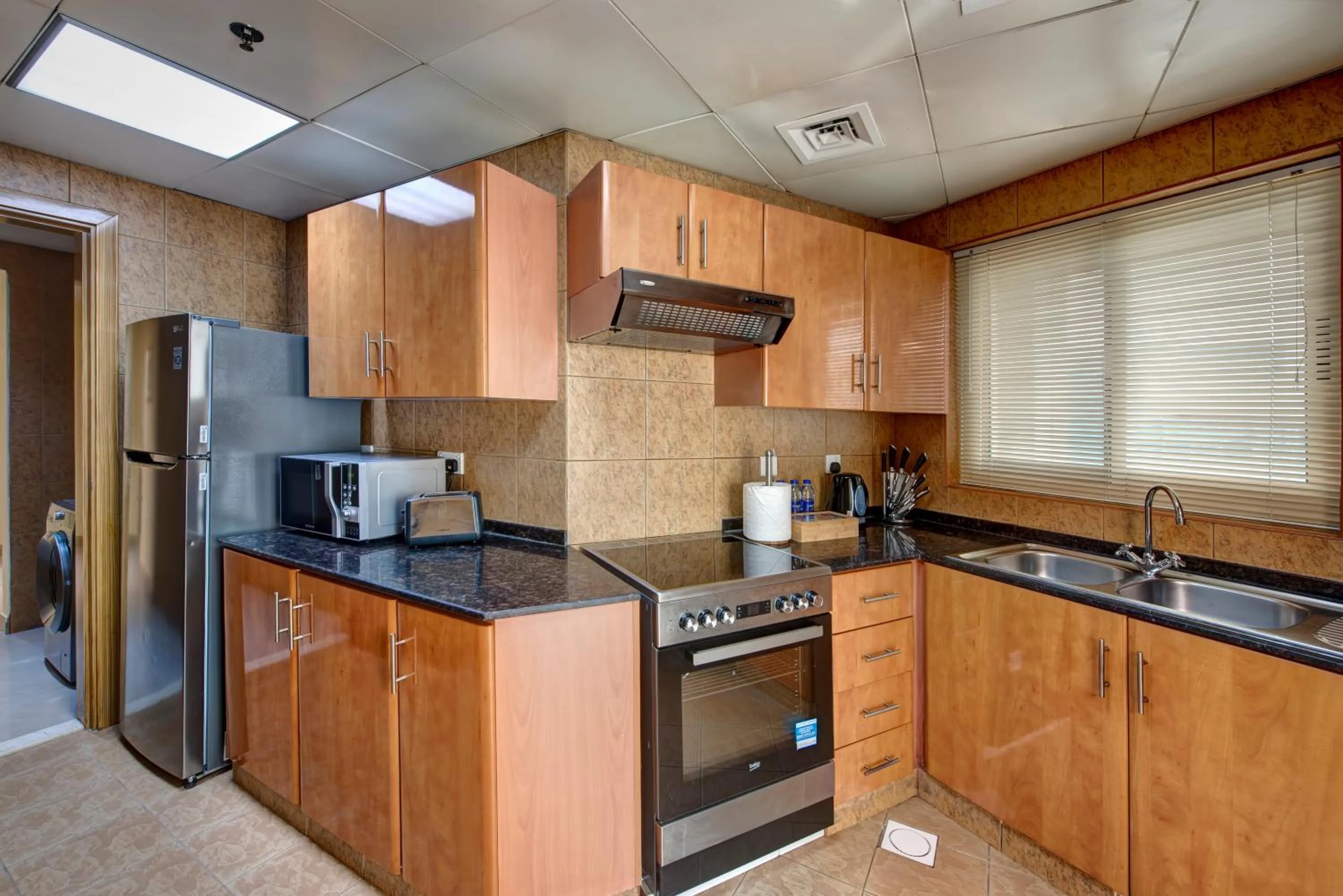 Kitchen or kitchenette in Radiance Premium Suites