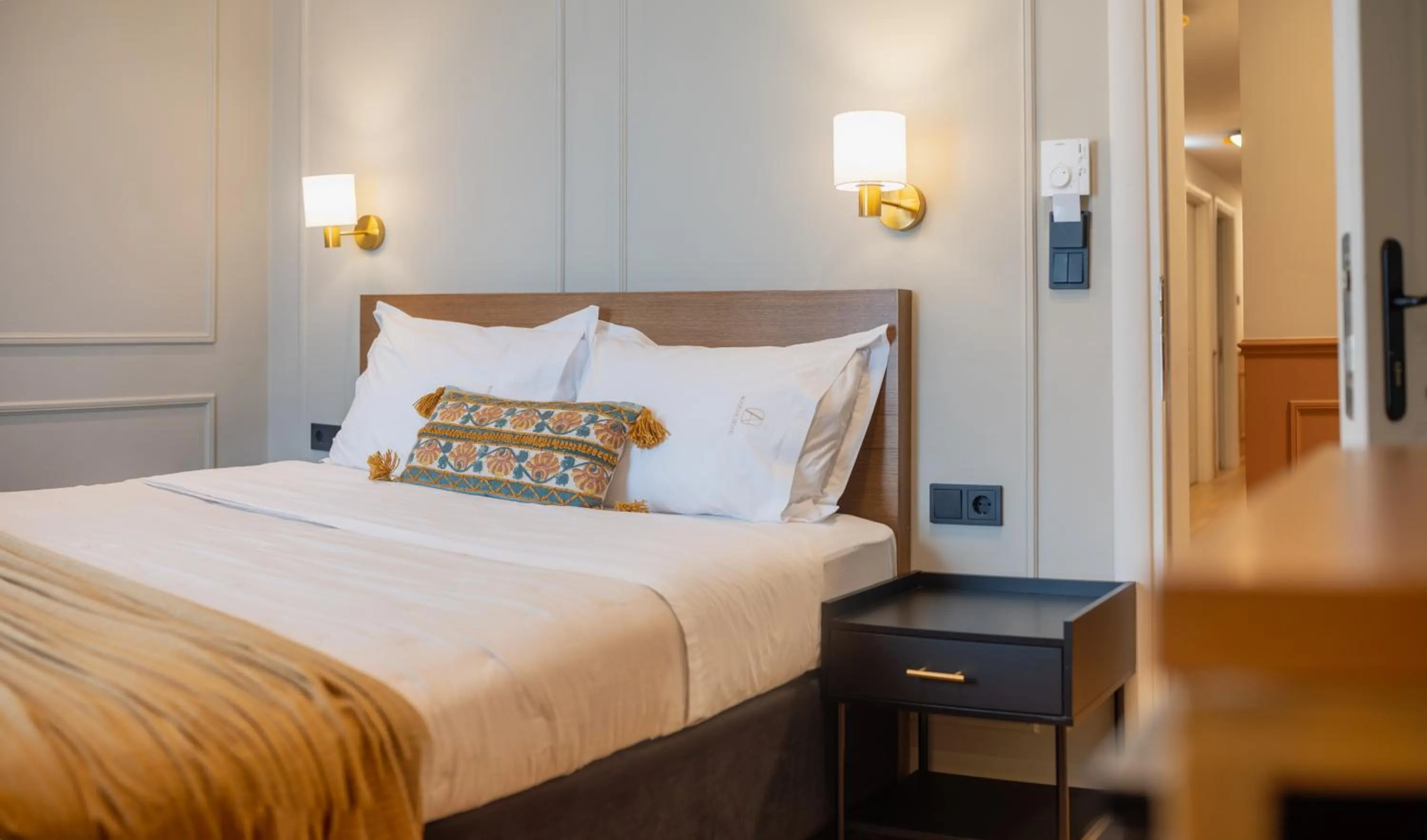 Bed in Aggelos Hotel