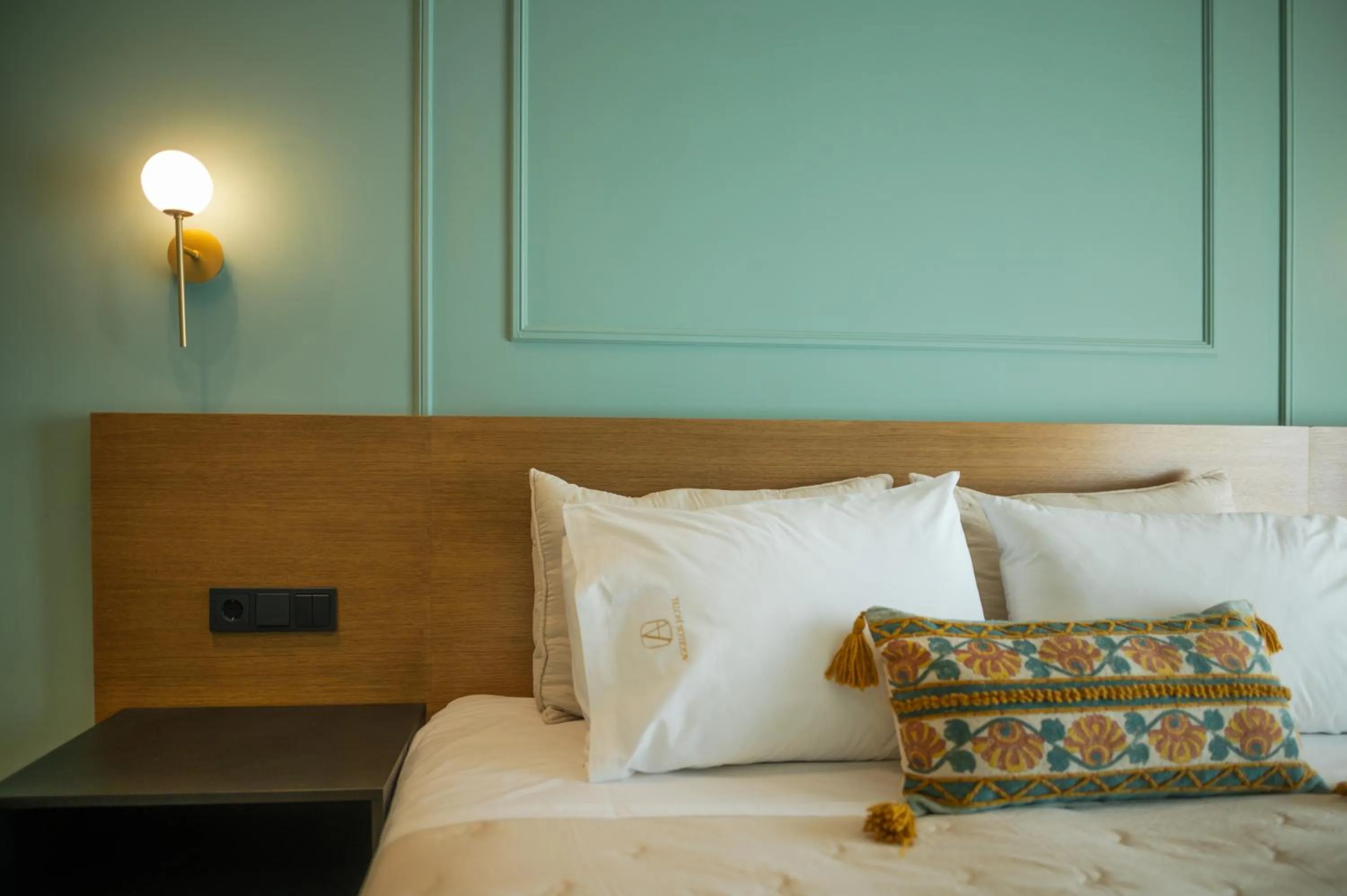 Bed in Aggelos Hotel