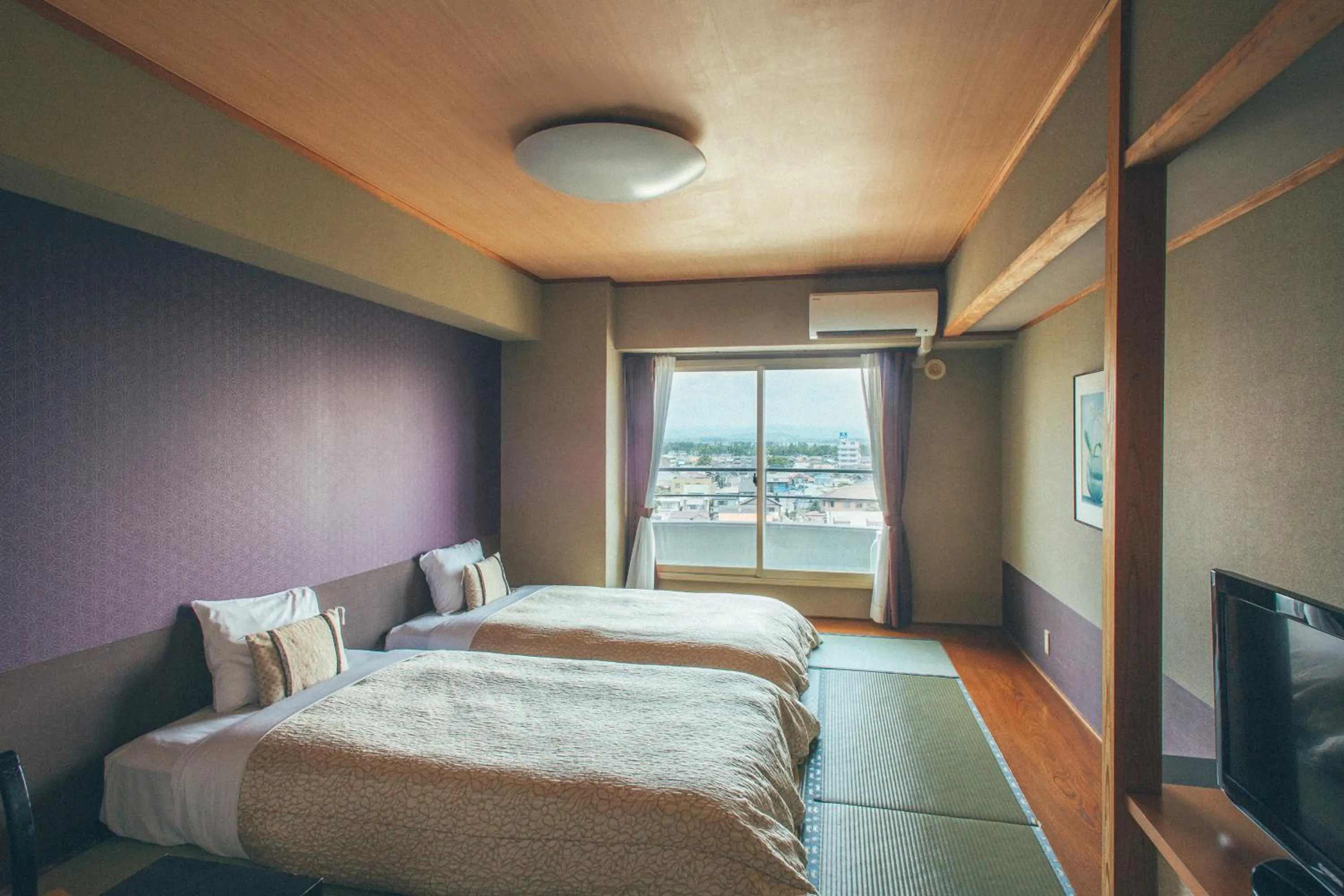 Bed in Hamanako Bentenjima Resort The Ocean