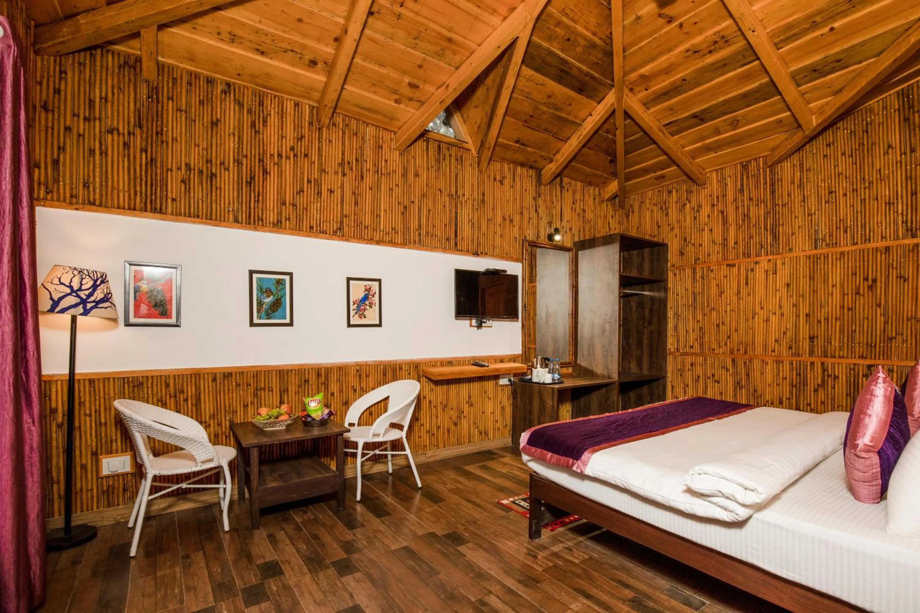 Communal lounge/ TV room, Bed in The Nature's Green Resort, Bhimtal, Nainital