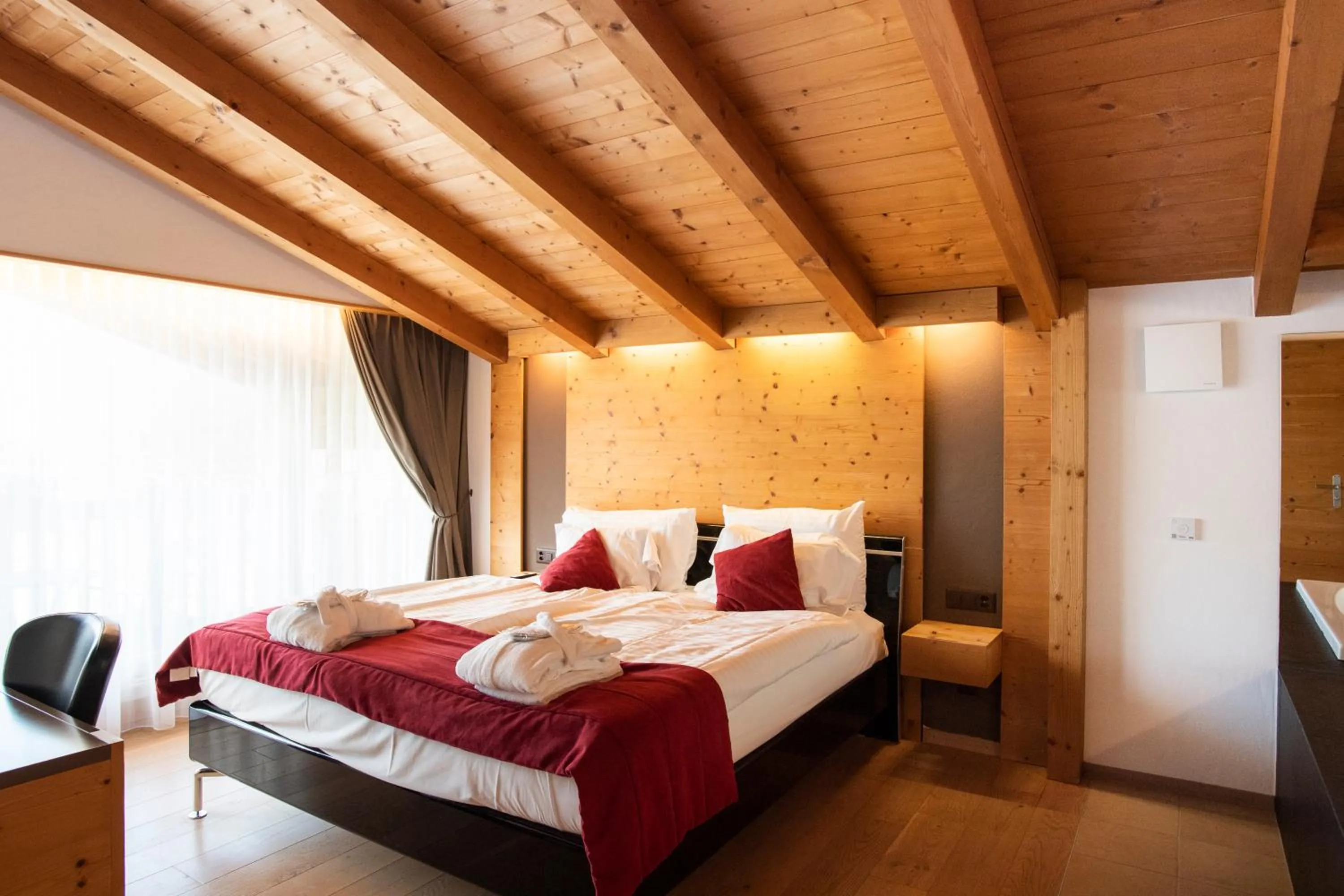 Bed in Hôtel Cailler & Bains de la Gruyère