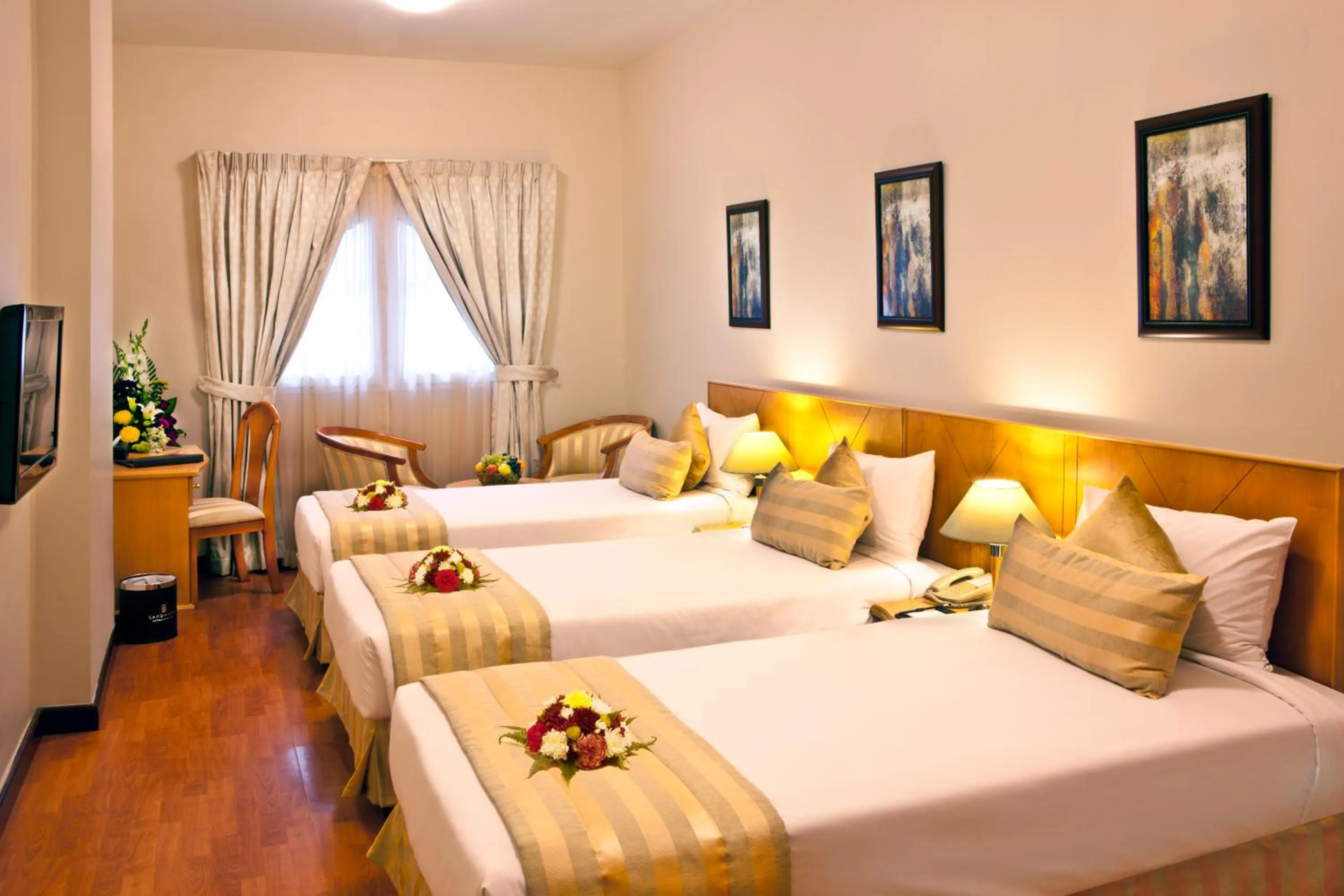 Bed in Landmark Plaza Hotel