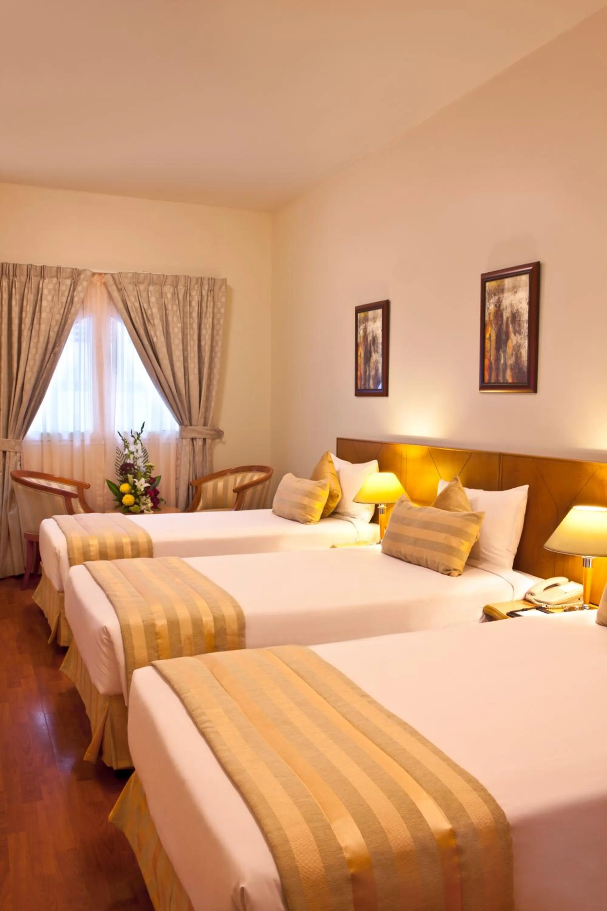 Bed in Landmark Plaza Hotel