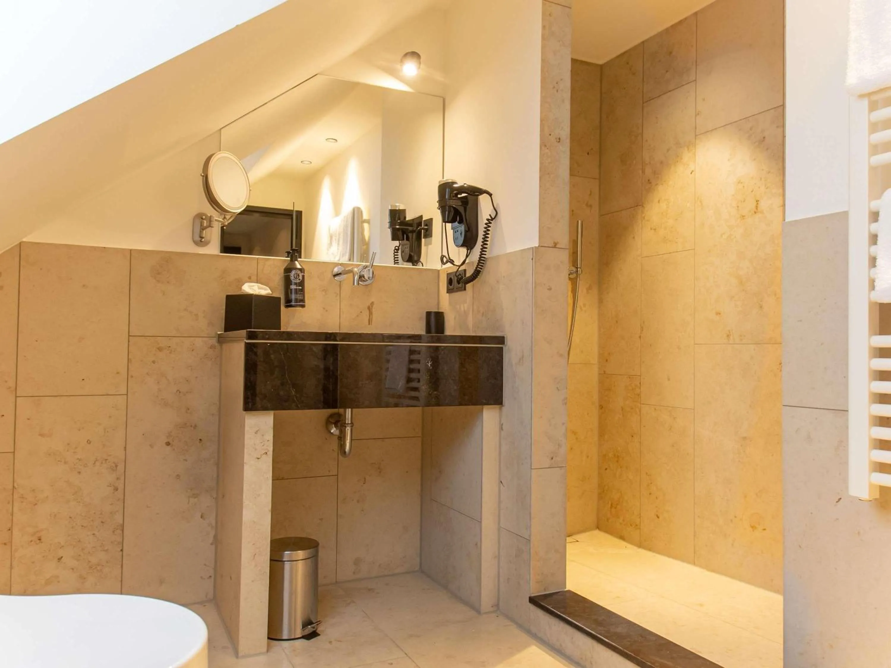 Bedroom in MUZE Hotel Dusseldorf - Handwritten Collection