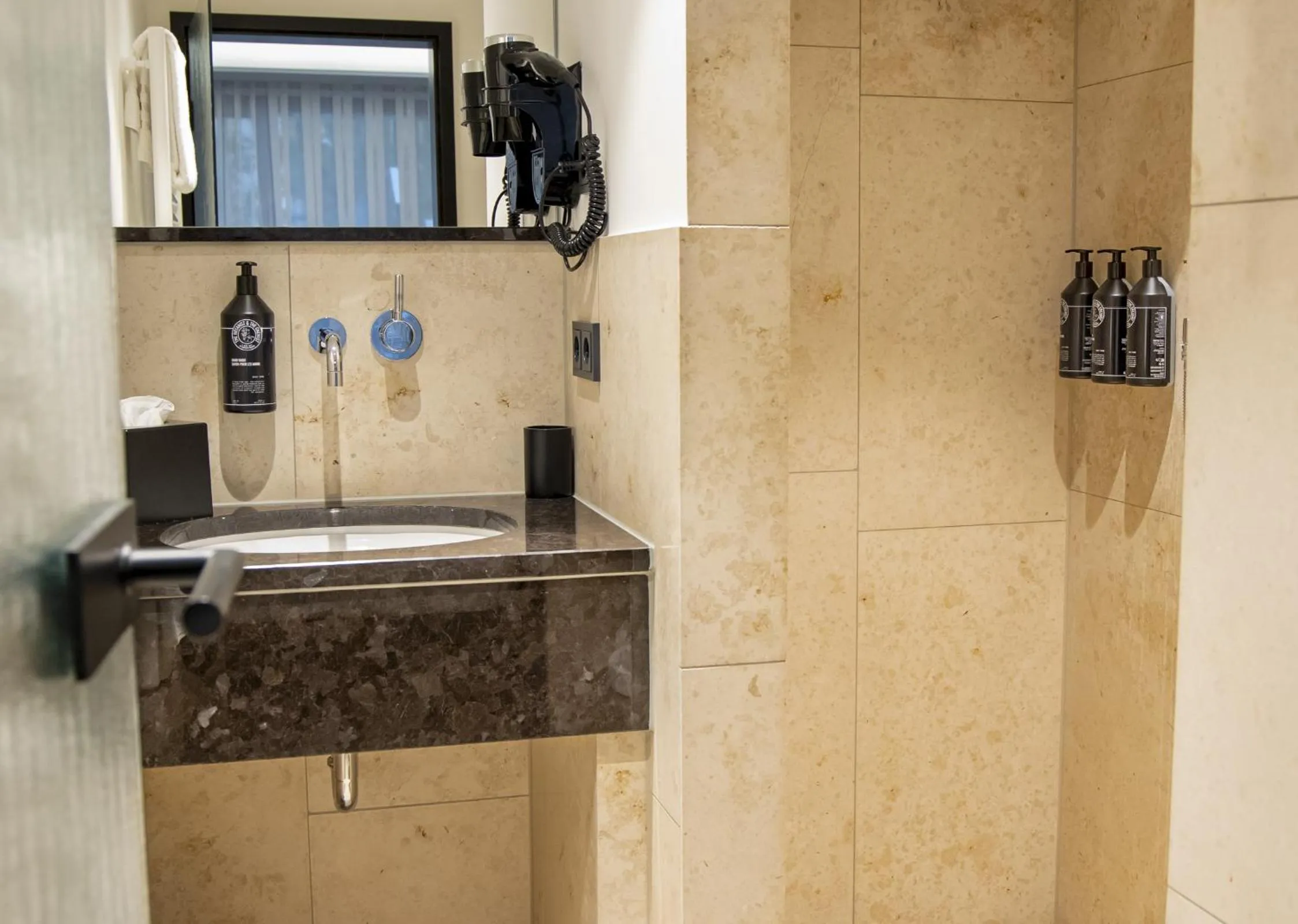 Bathroom in MUZE Hotel Dusseldorf - Handwritten Collection