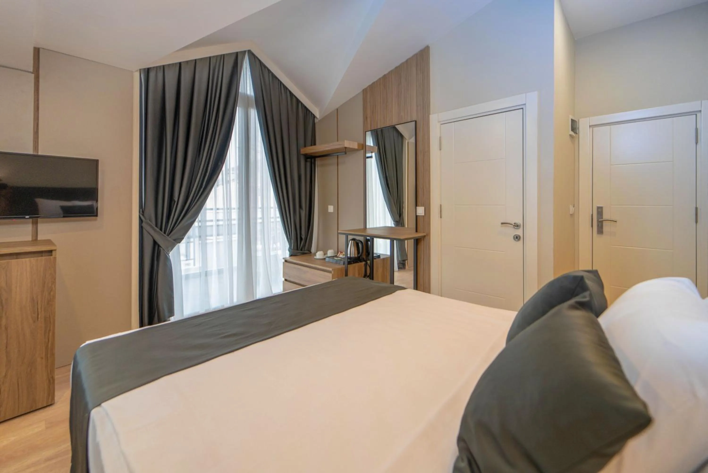 Photo of the whole room, Bed in Deniz Boutique Hotel