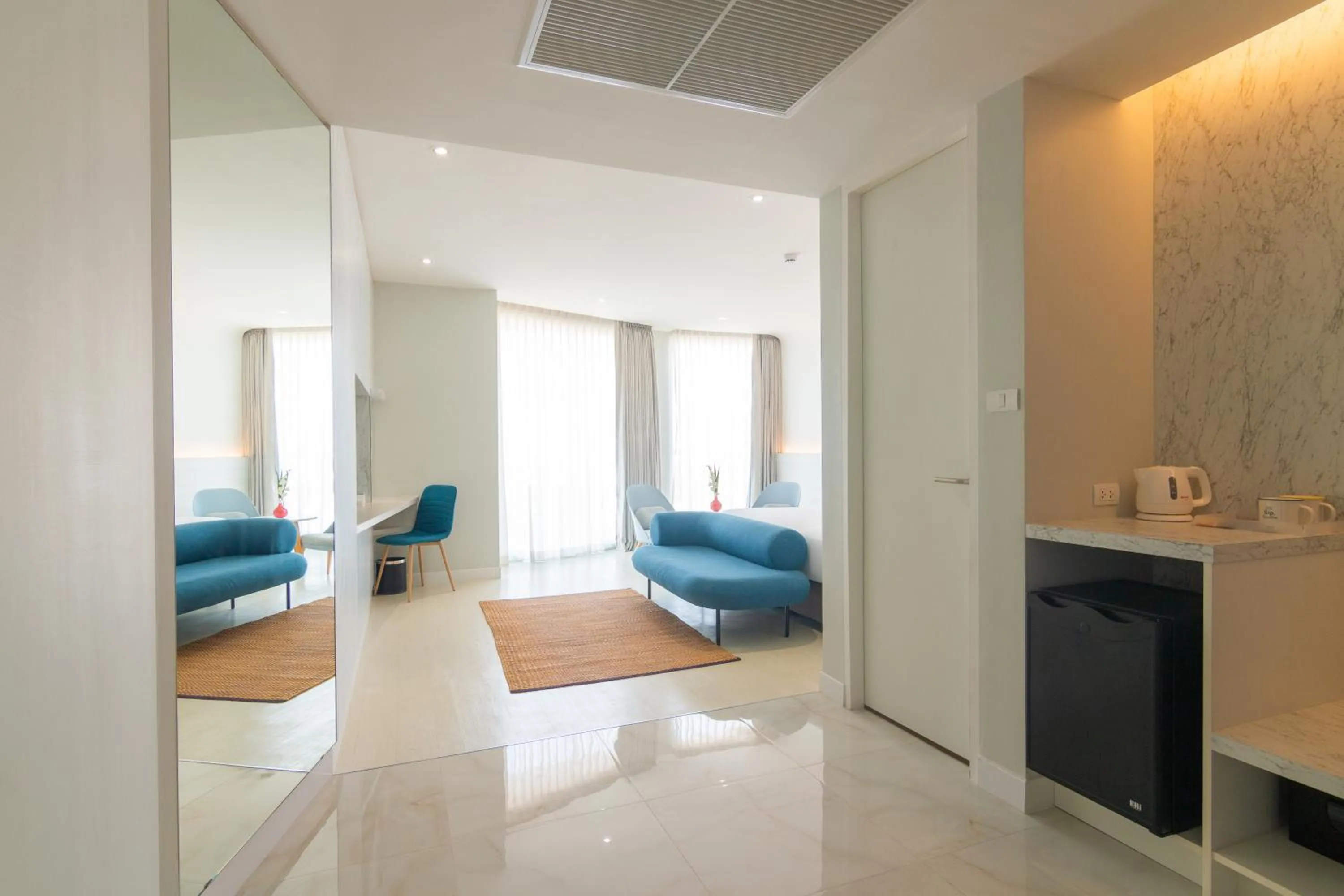 Seating area in VELA Dhi Udon Thani