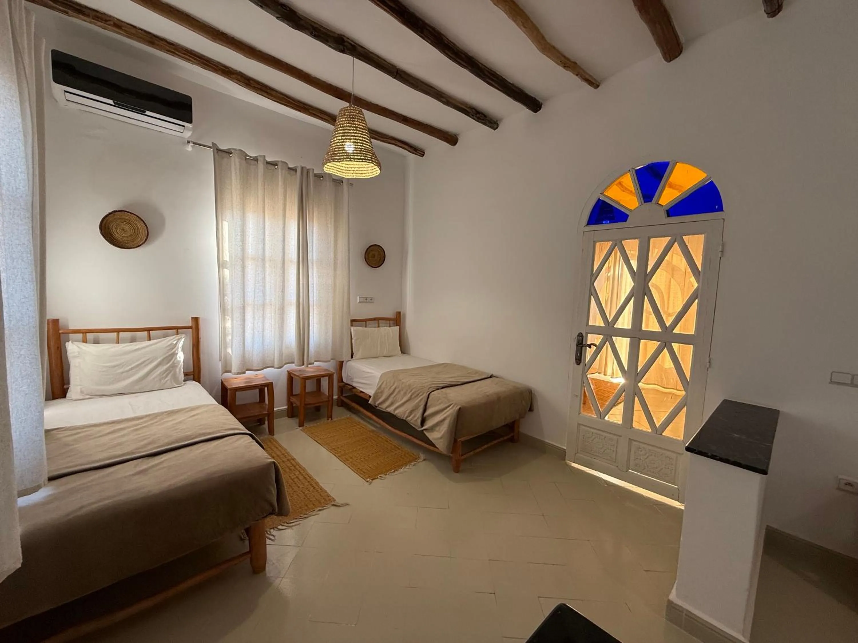 Bed in Le Parc des Oliviers Ecolodge