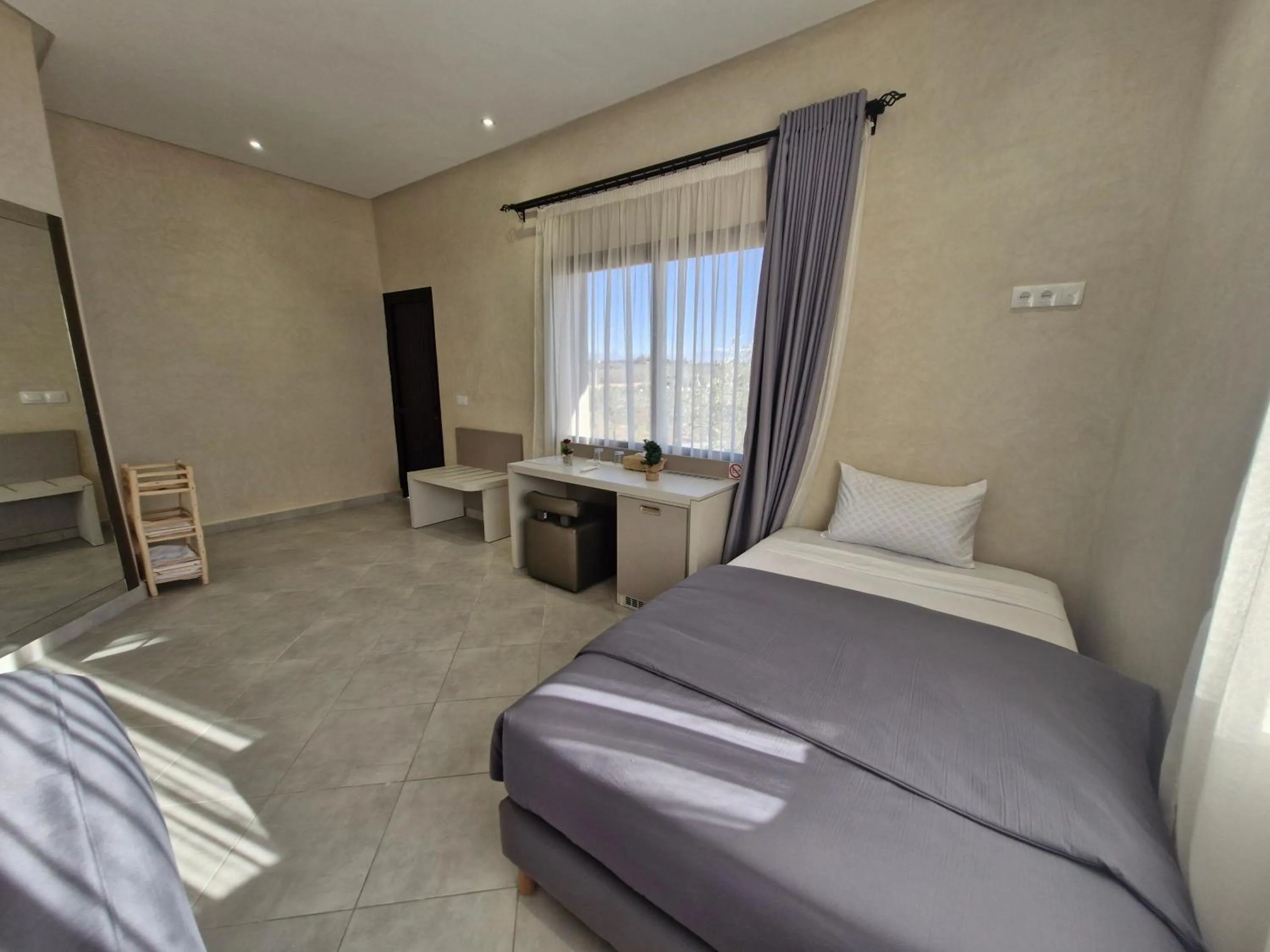 Bed in Le Parc des Oliviers Ecolodge