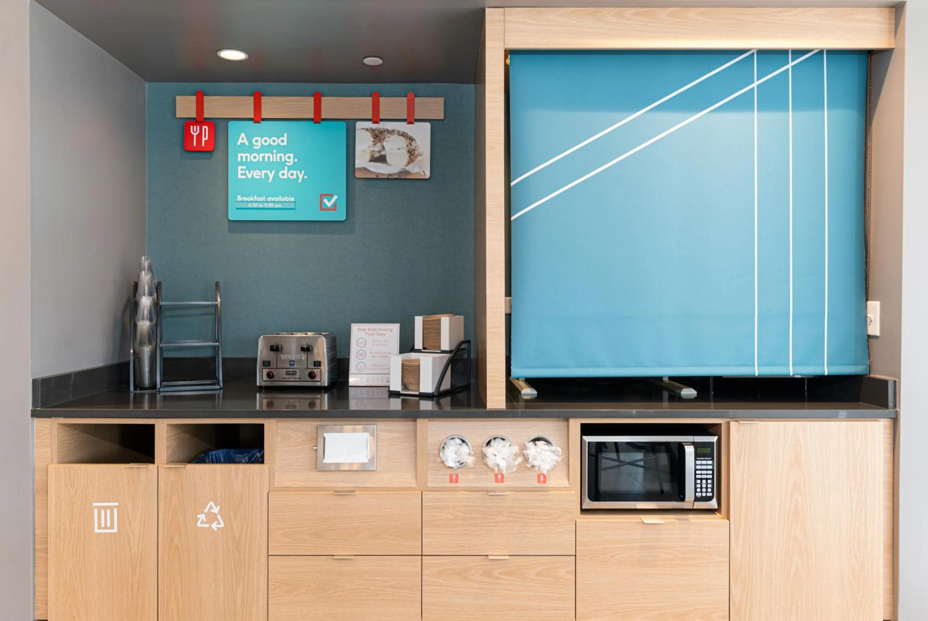 Kitchen or kitchenette in avid hotel Summerville by IHG