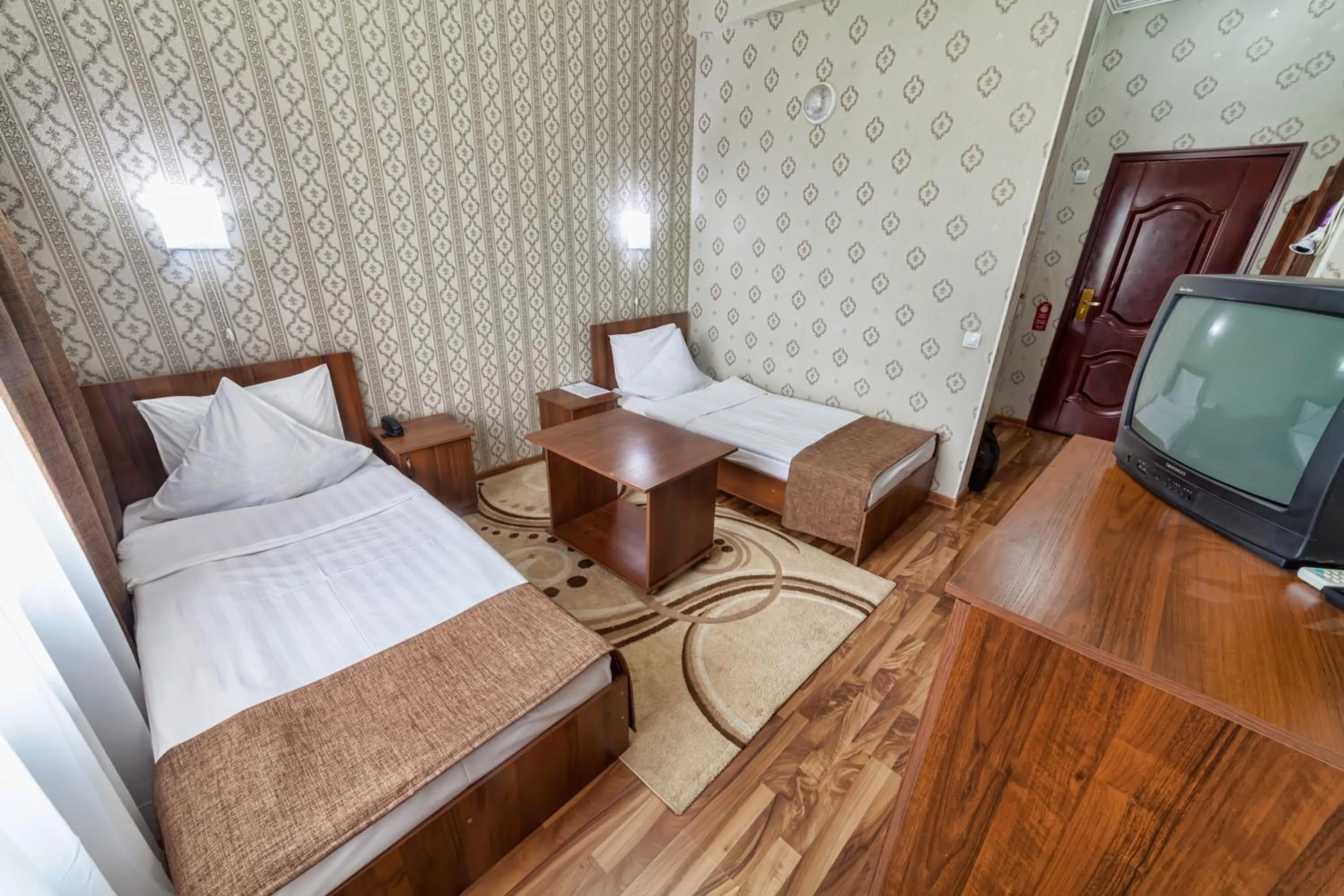 Bed in Hotel Osh-Nuru