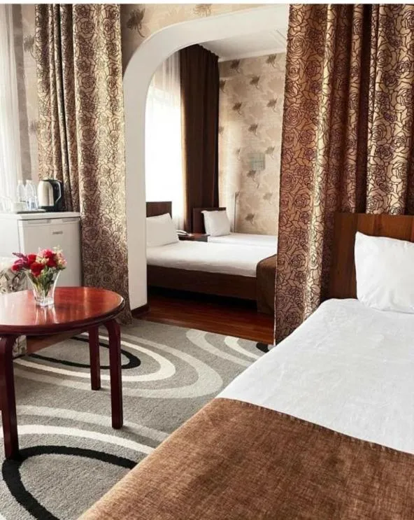 Bed in Hotel Osh-Nuru