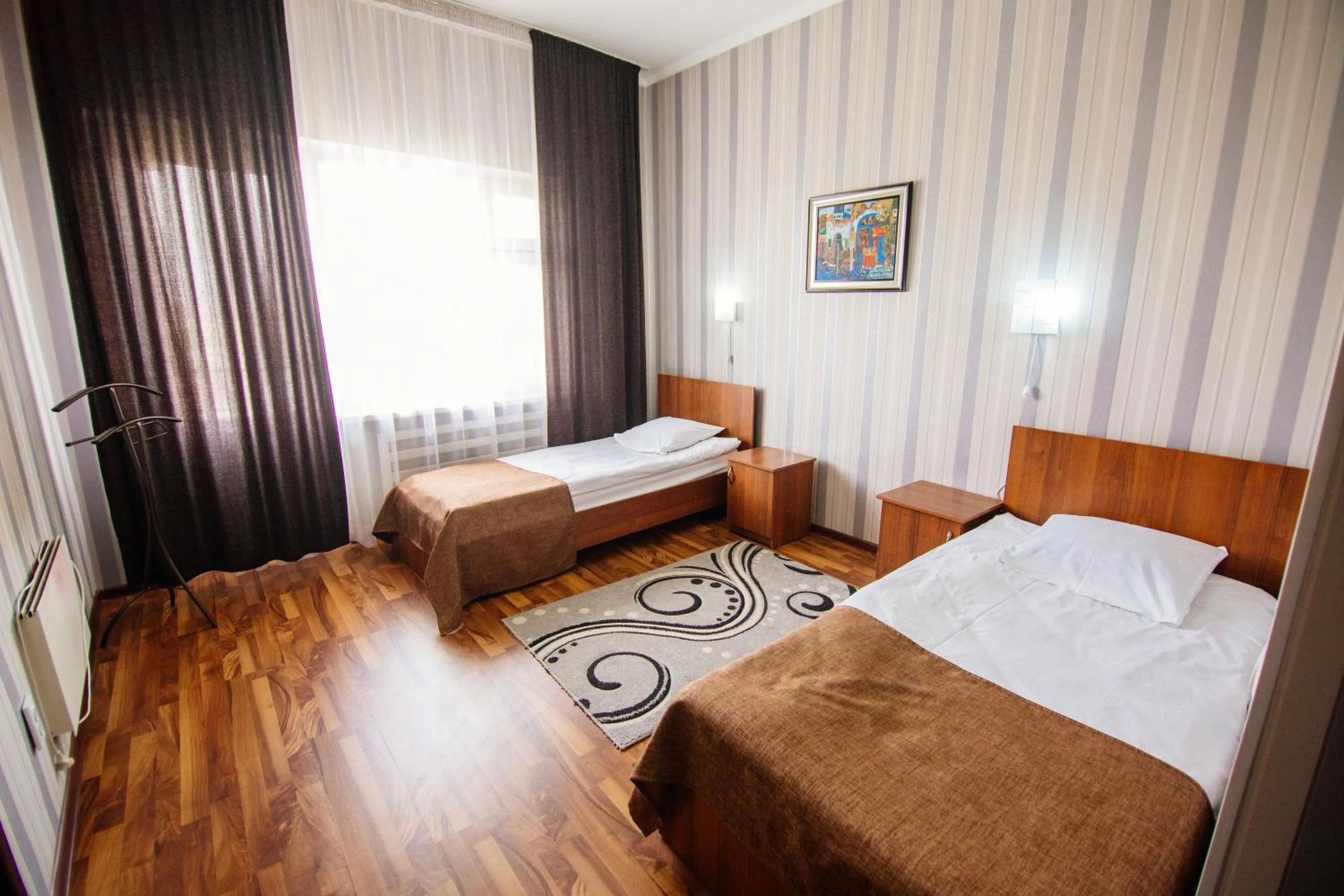 Bed in Hotel Osh-Nuru