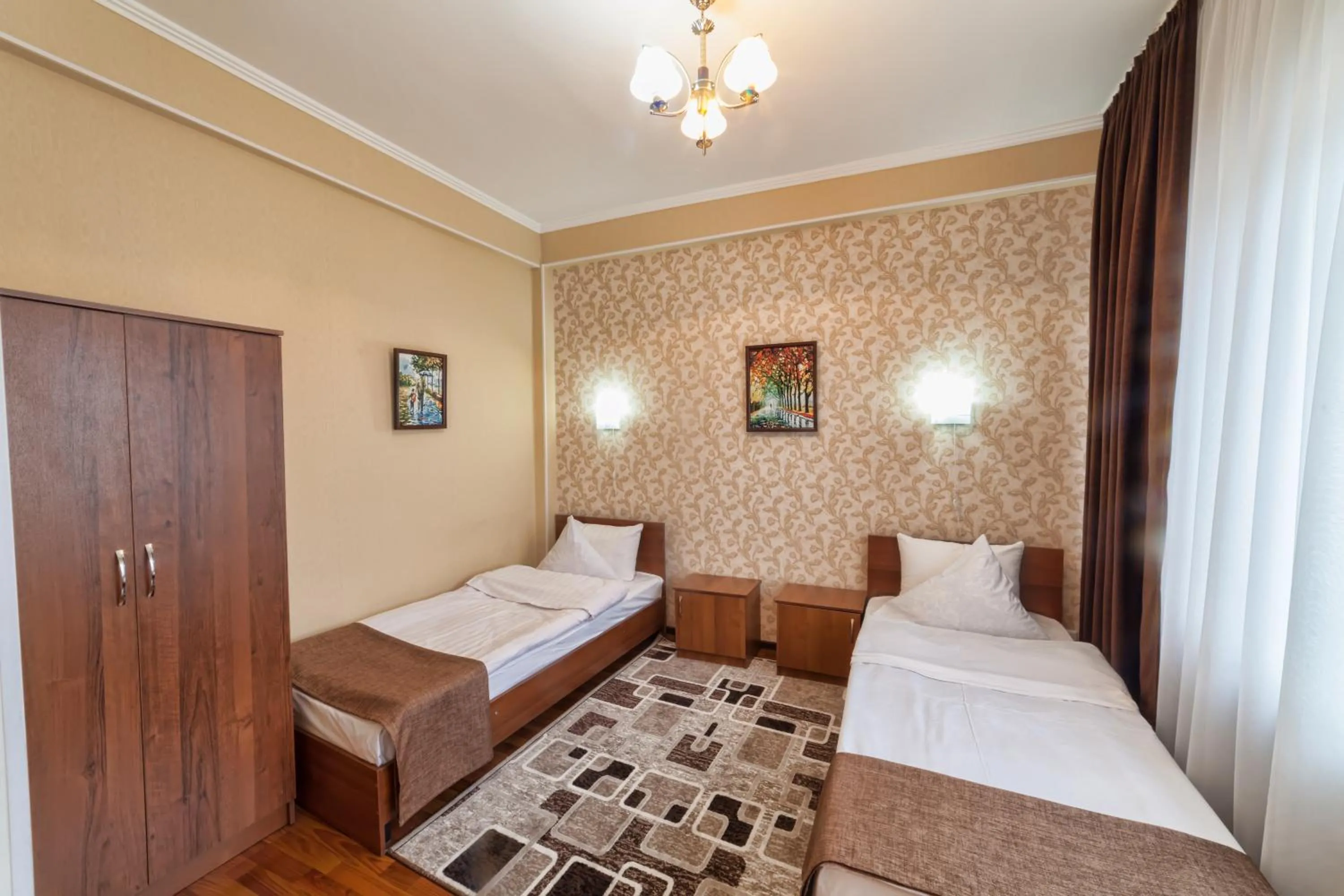 Bed in Hotel Osh-Nuru