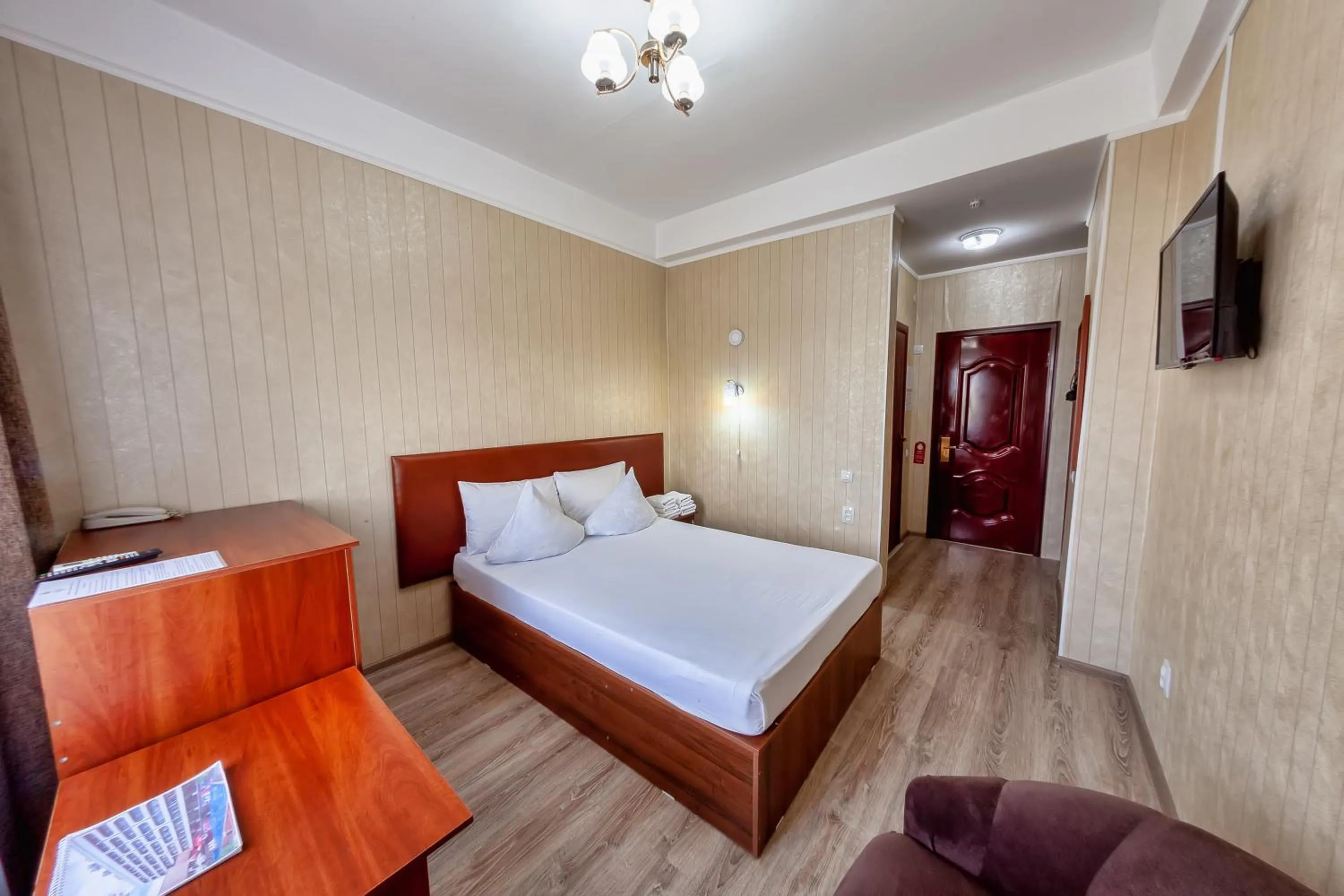 Bed in Hotel Osh-Nuru