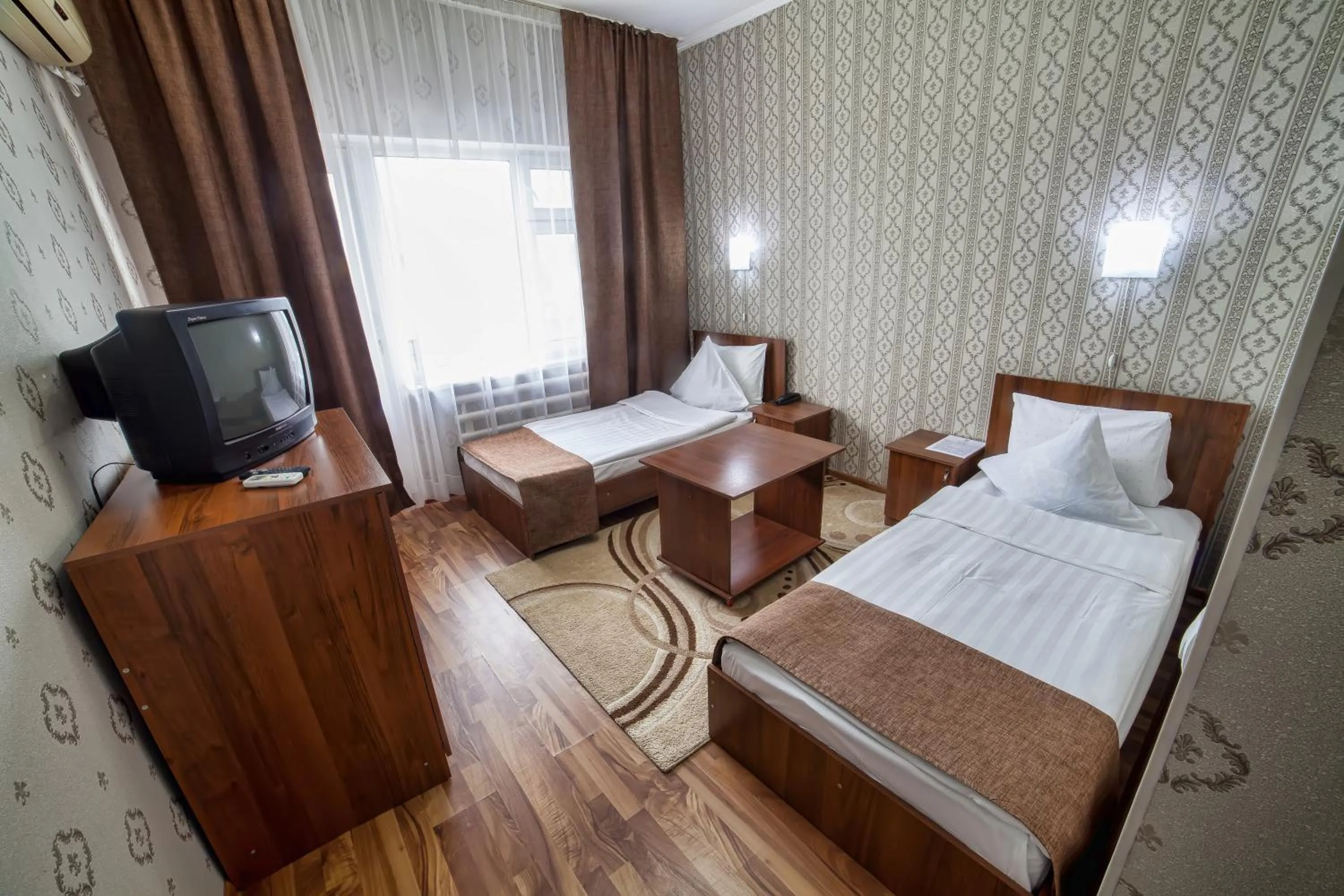 Bed in Hotel Osh-Nuru