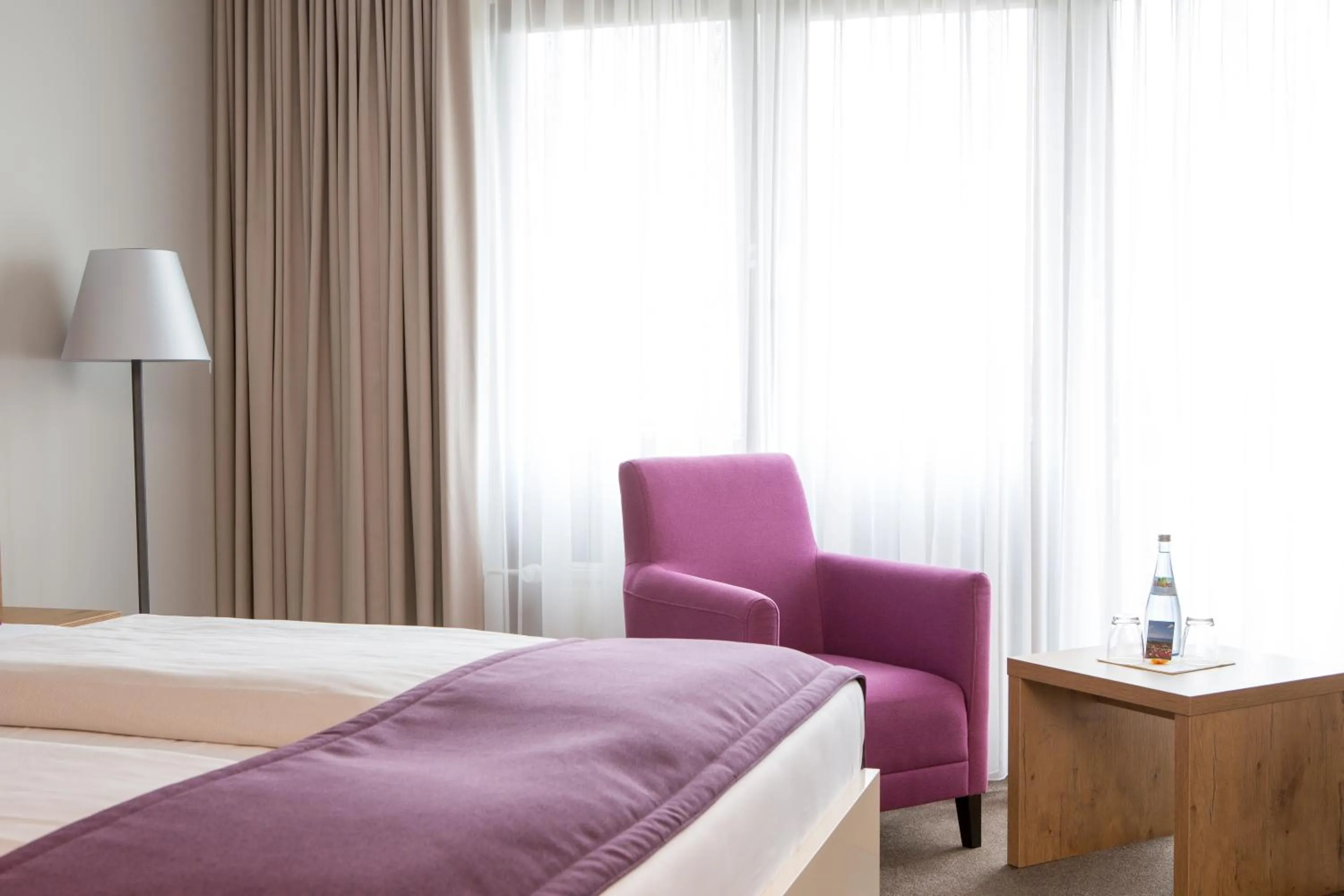 Photo of the whole room, Bed in ARAMIS Tagungs- und Sporthotel