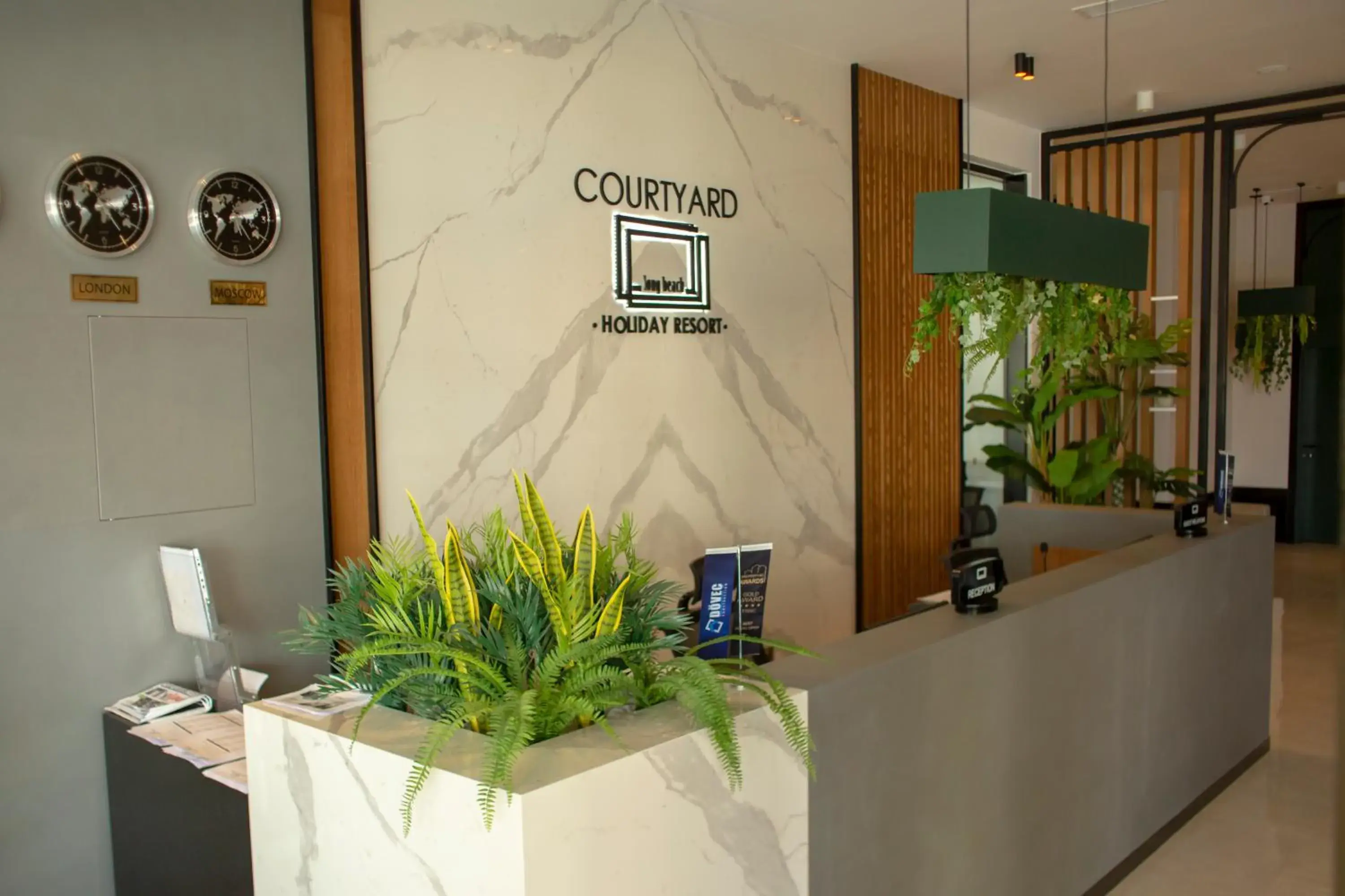 Lobby or reception in Courtyard Long Beach Holiday Resort Lobby or reception in Courtyard Long Beach Holiday Resort