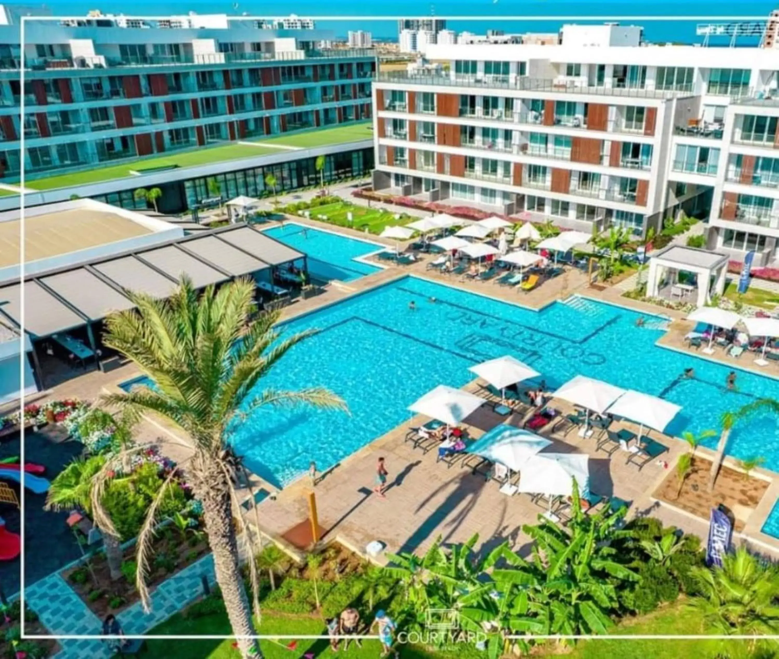 Property building in Courtyard Long Beach Holiday Resort Property building in Courtyard Long Beach Holiday Resort