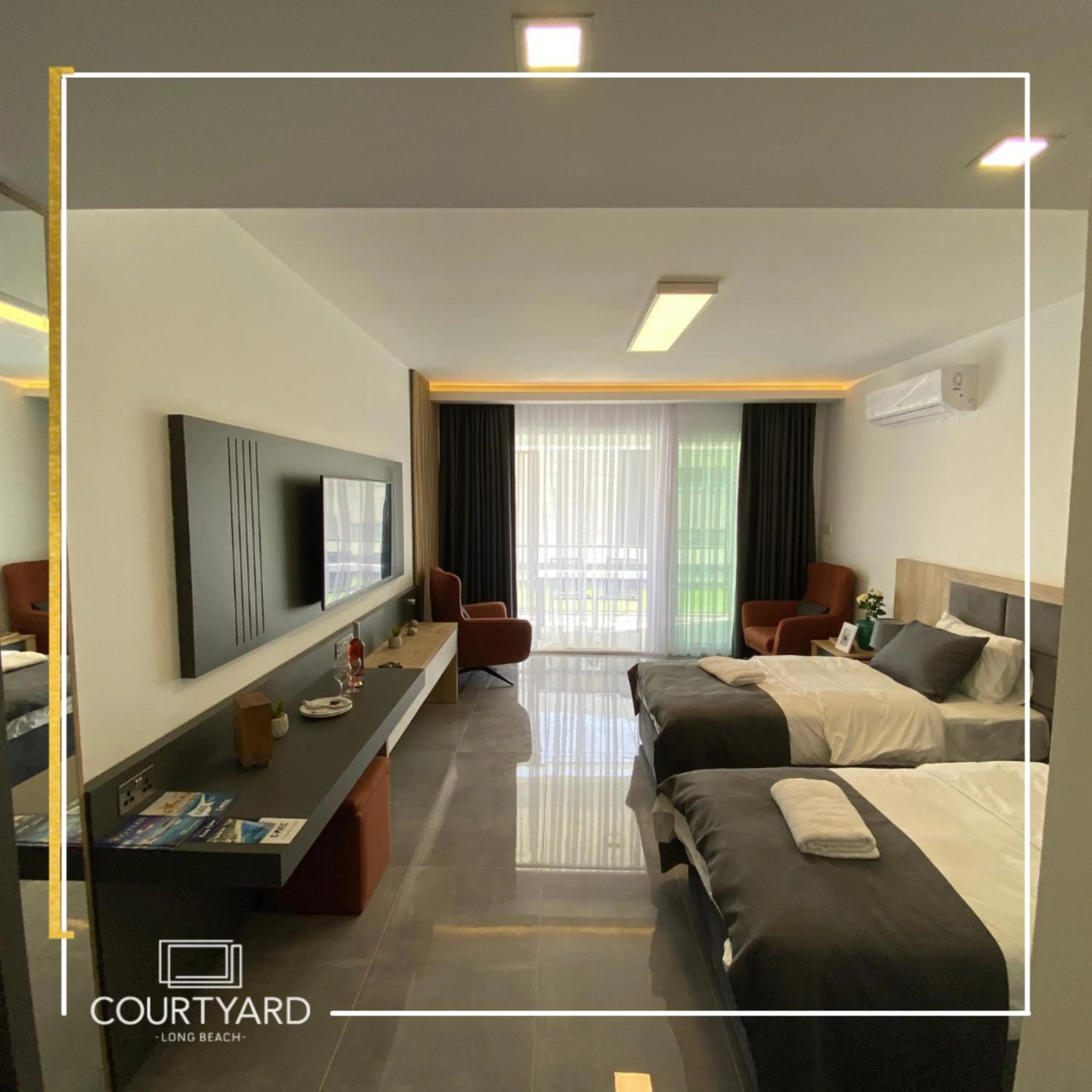 Bed in Courtyard Long Beach Holiday Resort