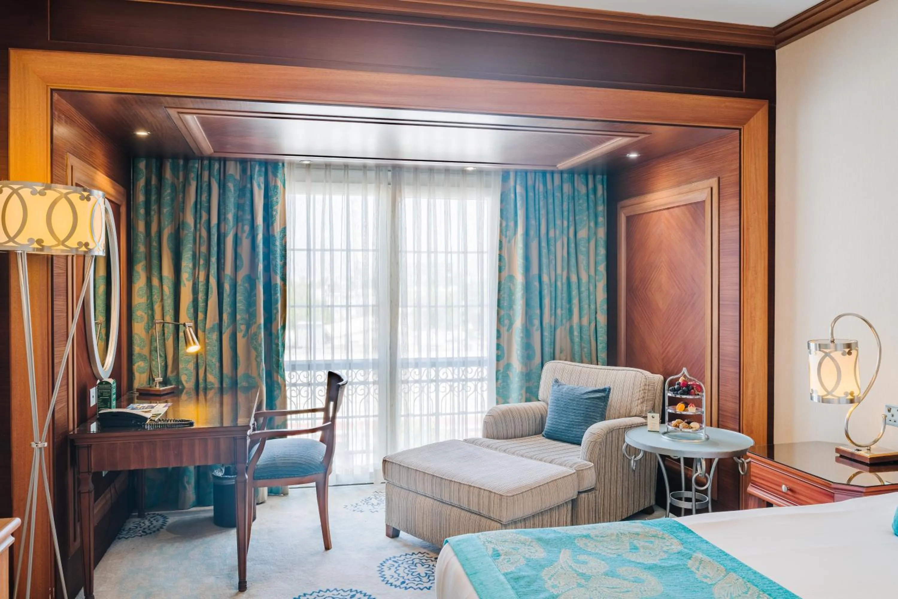 Seating area, Bed in The Arkin Colony Hotel