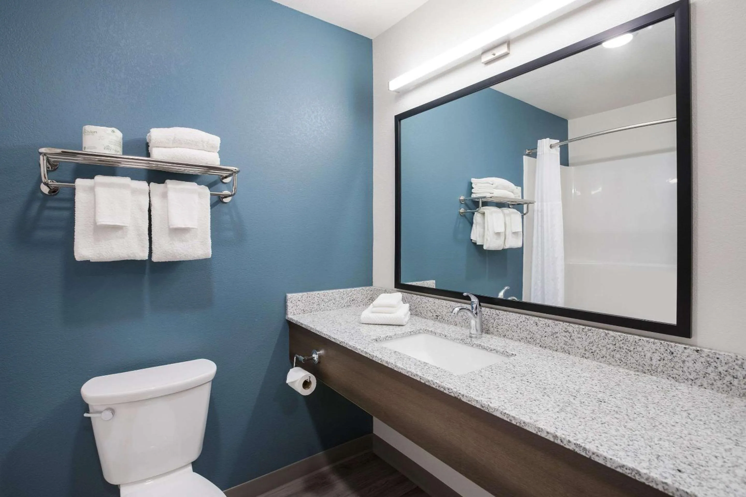 Toilet in WoodSpring Suites Detroit Madison Heights