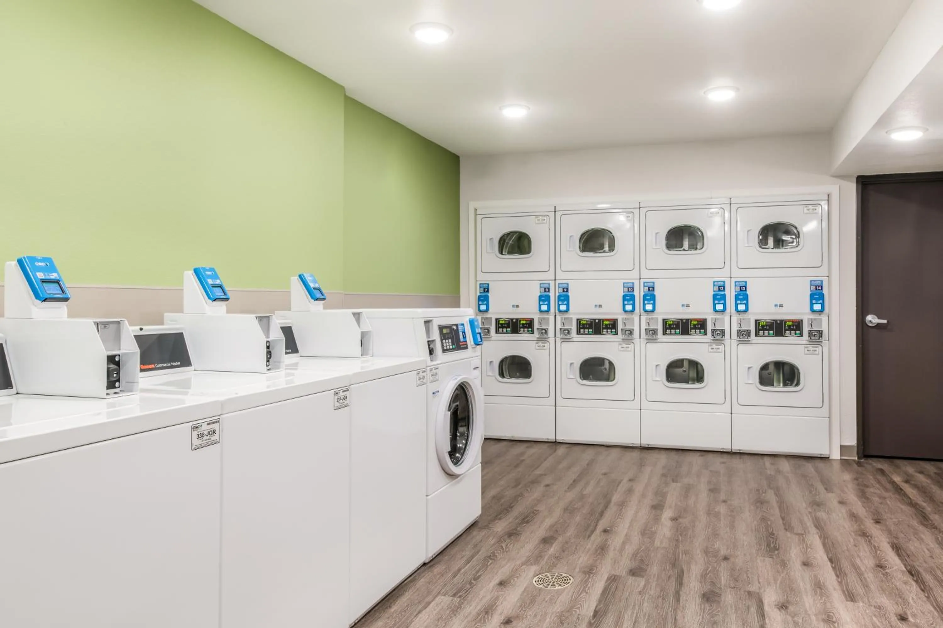 laundry in WoodSpring Suites Charlotte - University Research Park