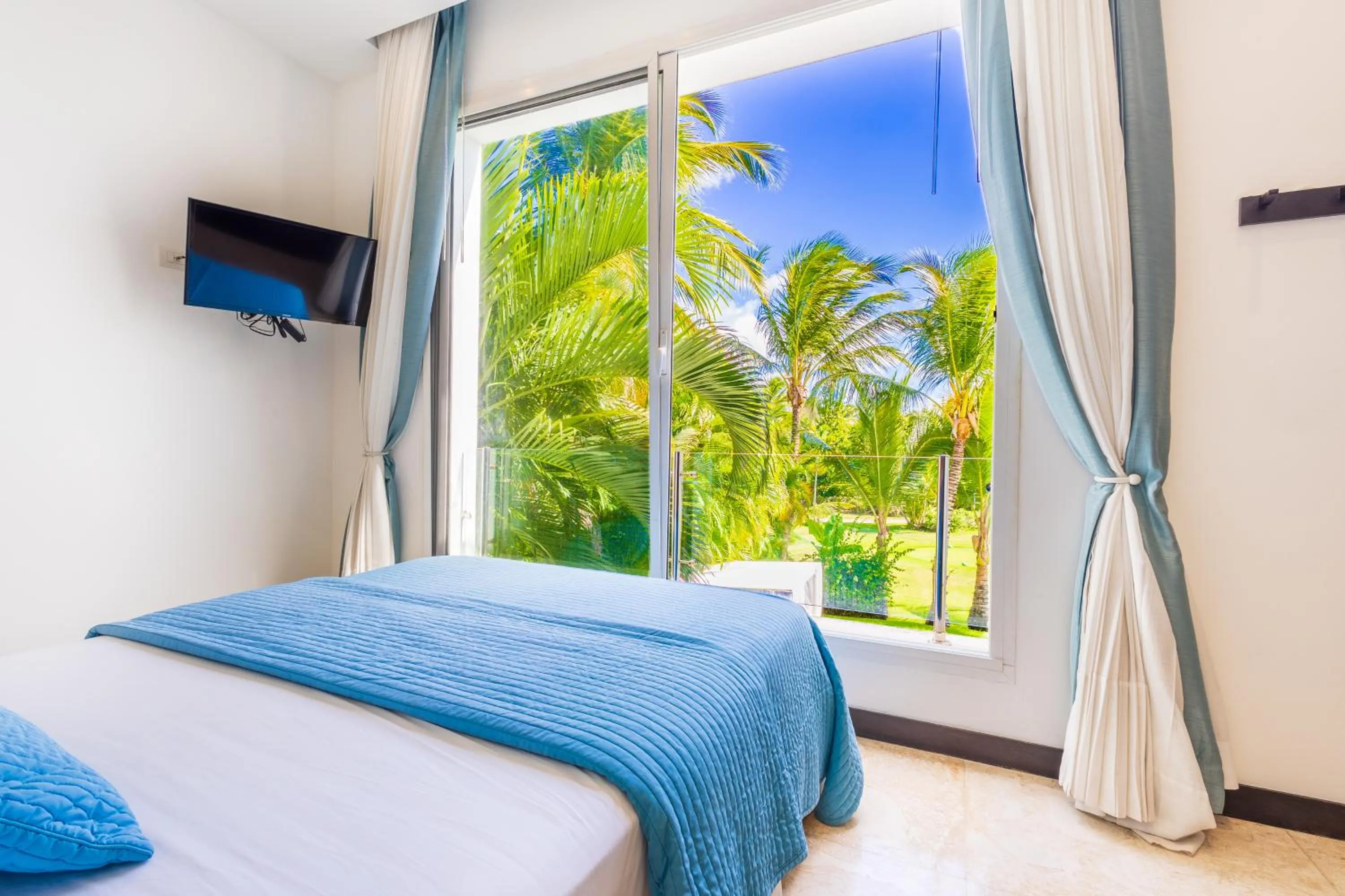 Bed in Luxury Rentals in Punta Cana - Exclusive Waterfall Villa with Private Pool, BBQ, Maid, Golf