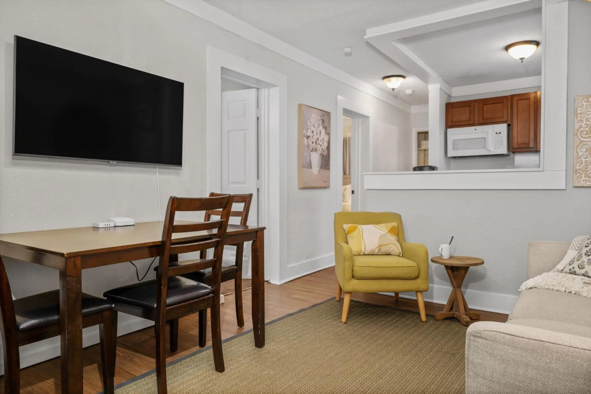 Living room in The Flats on Florida St - Super Comfy 2-Bedroom Apartments