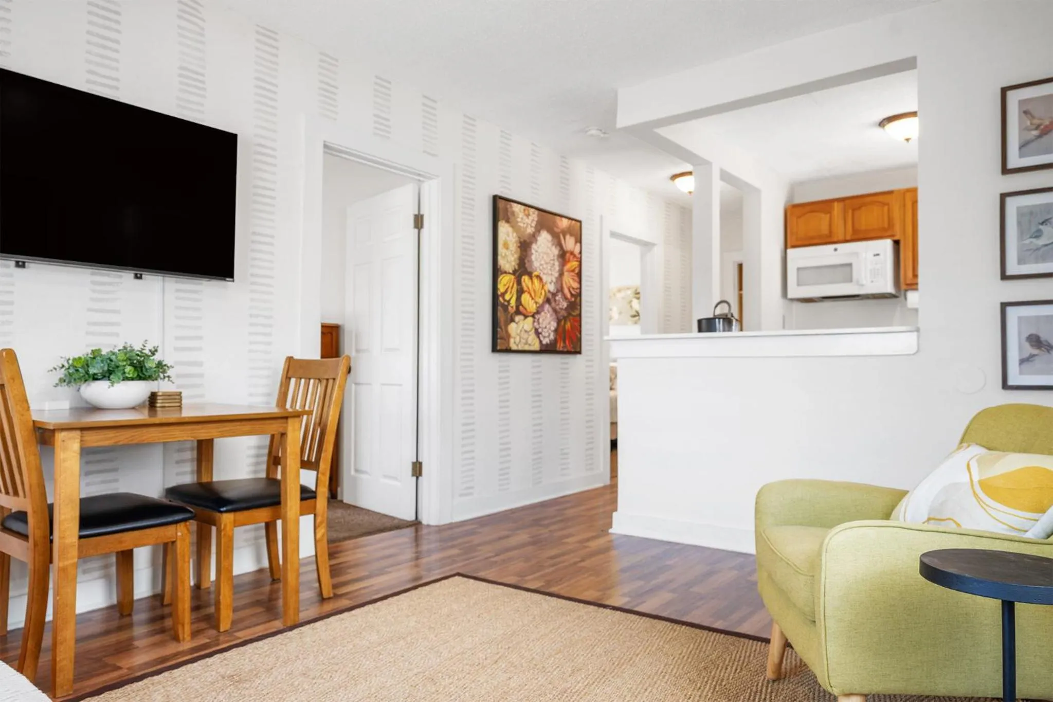 Living room in The Flats on Florida St - Super Comfy 2-Bedroom Apartments